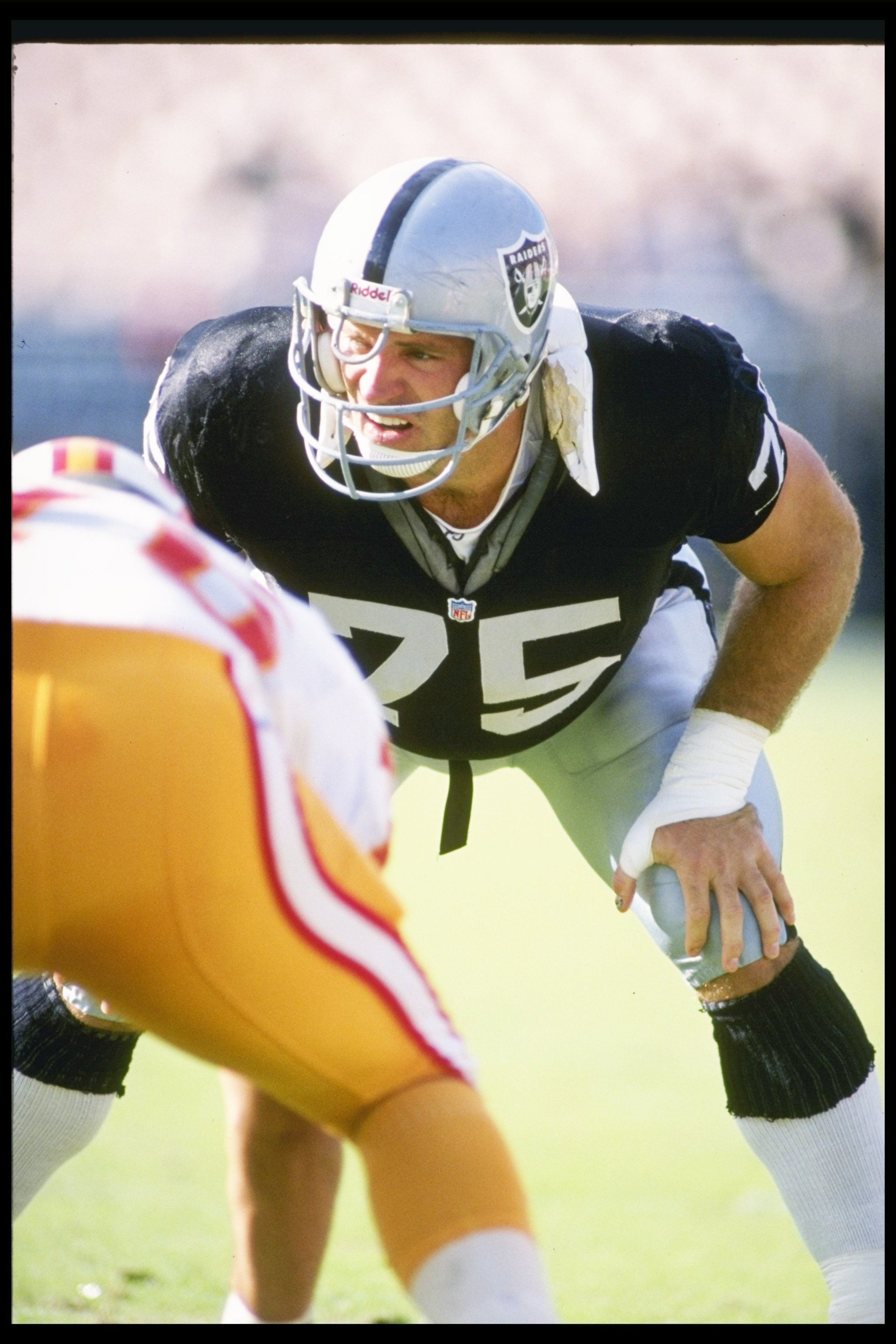 19 Dec 1993:  Defensive lineman Howie Long of the Los Angeles Raiders looks on during a game against the Tampa Bay Buccaneers at the Los Angeles Memorial Coliseum in Los Angeles, California.  The Raiders won the game, 27-20. Mandatory Credit: Markus Boesc