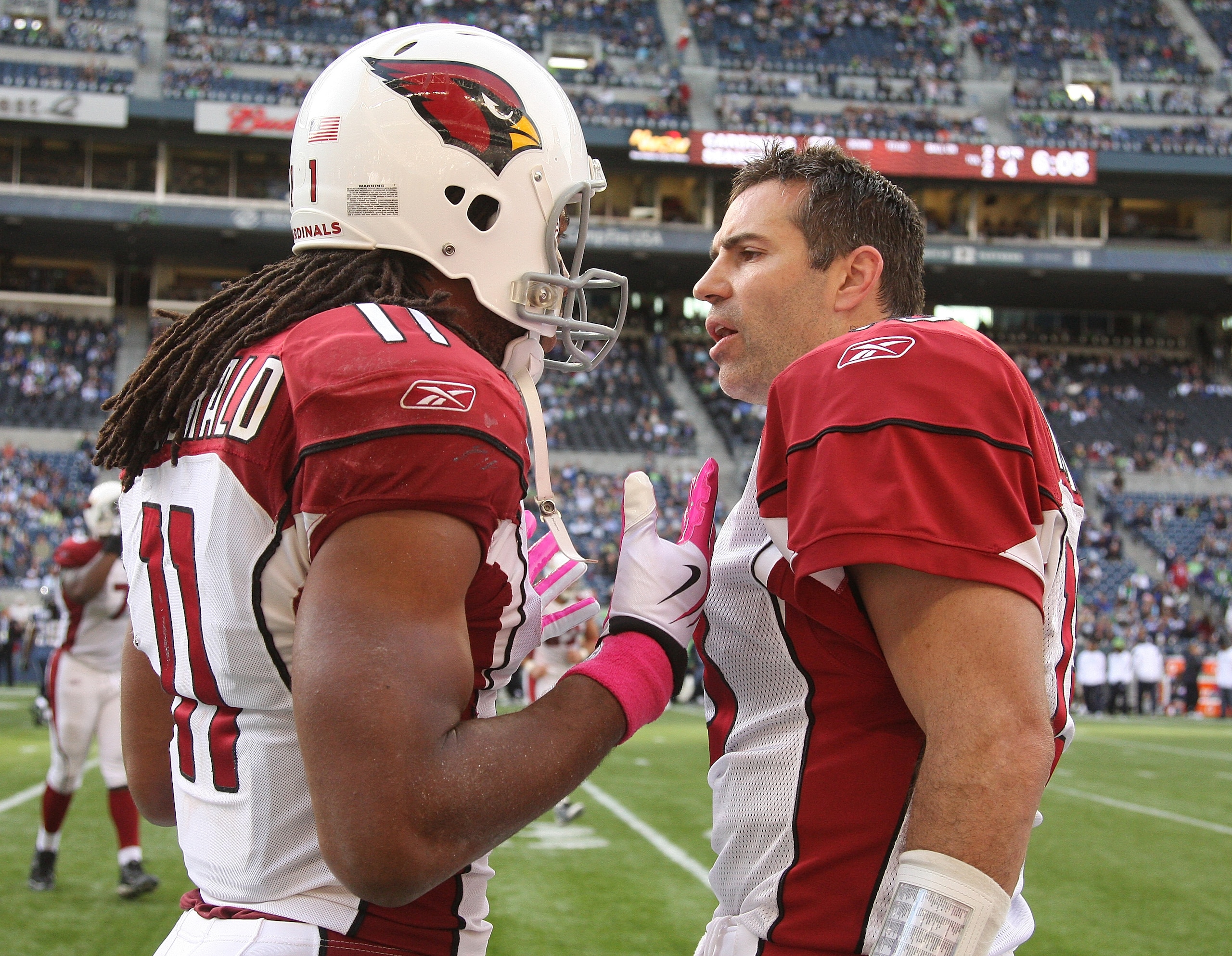 SEATTLE - OCTOBER 18: Quarterback Kurt Warner #13 (R) of the Arizona Cardinals exchanges words with wide receiver Larry Fitzgerald #11during the game against the Seattle Seahawks on October 18, 2009 at Qwest Field in Seattle, Washington. (Photo by Otto Gr SEATTLE - OCTOBER 18: Quarterback Kurt Warner #13 (R) of the Arizona Cardinals exchanges words with wide receiver Larry Fitzgerald #11during the game against the Seattle Seahawks on October 18, 2009 at Qwest Field in Seattle, Washington. (Photo by Otto Gr
