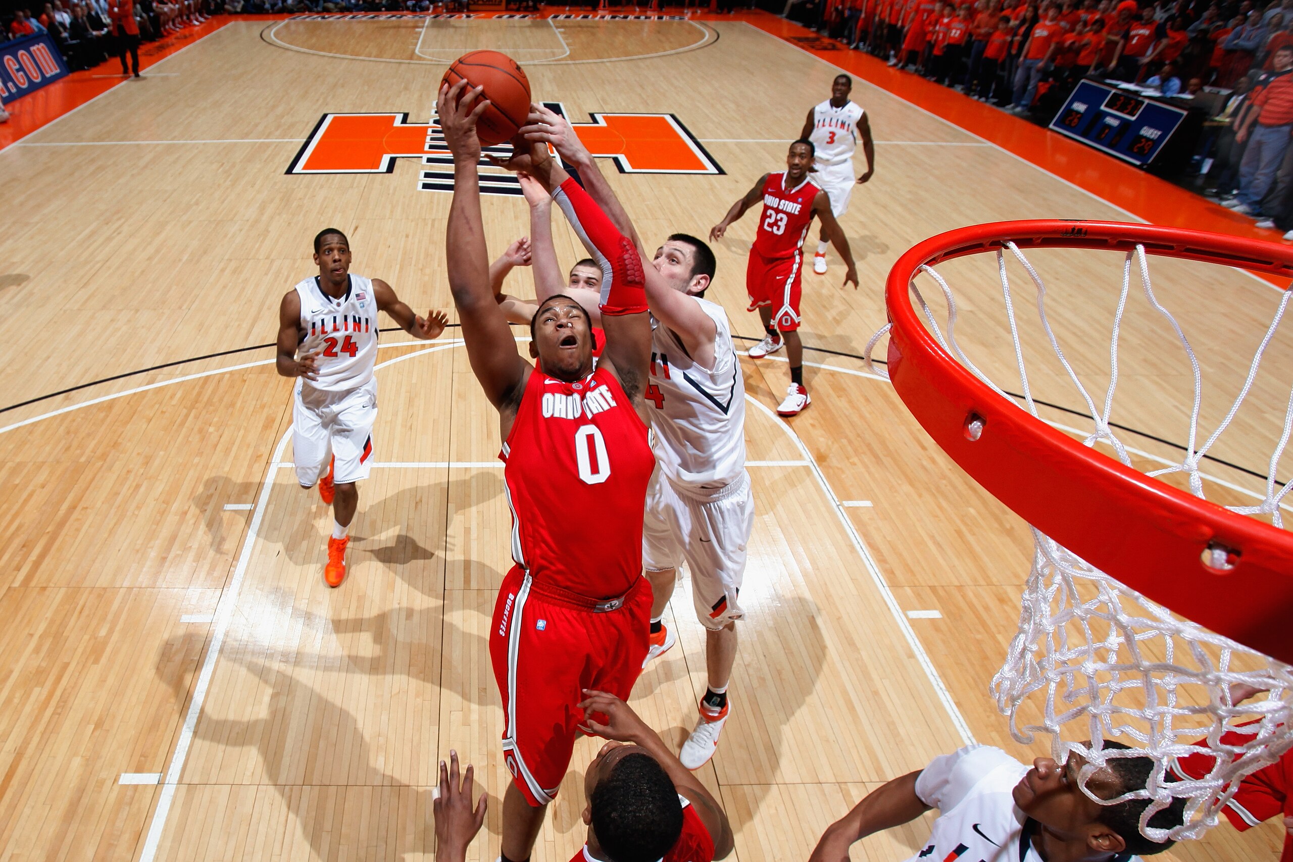 CHAMPAIGN, IL - JANUARY 22: Jared Sullinger #0 of the Ohio State Buckeyes pulls down one of his game-high 16 rebounds against the Illinois Fighting Illini at Assembly Hall on January 22, 2011 in Champaign, Illinois. Ohio State won 73-68. (Photo by Joe Rob