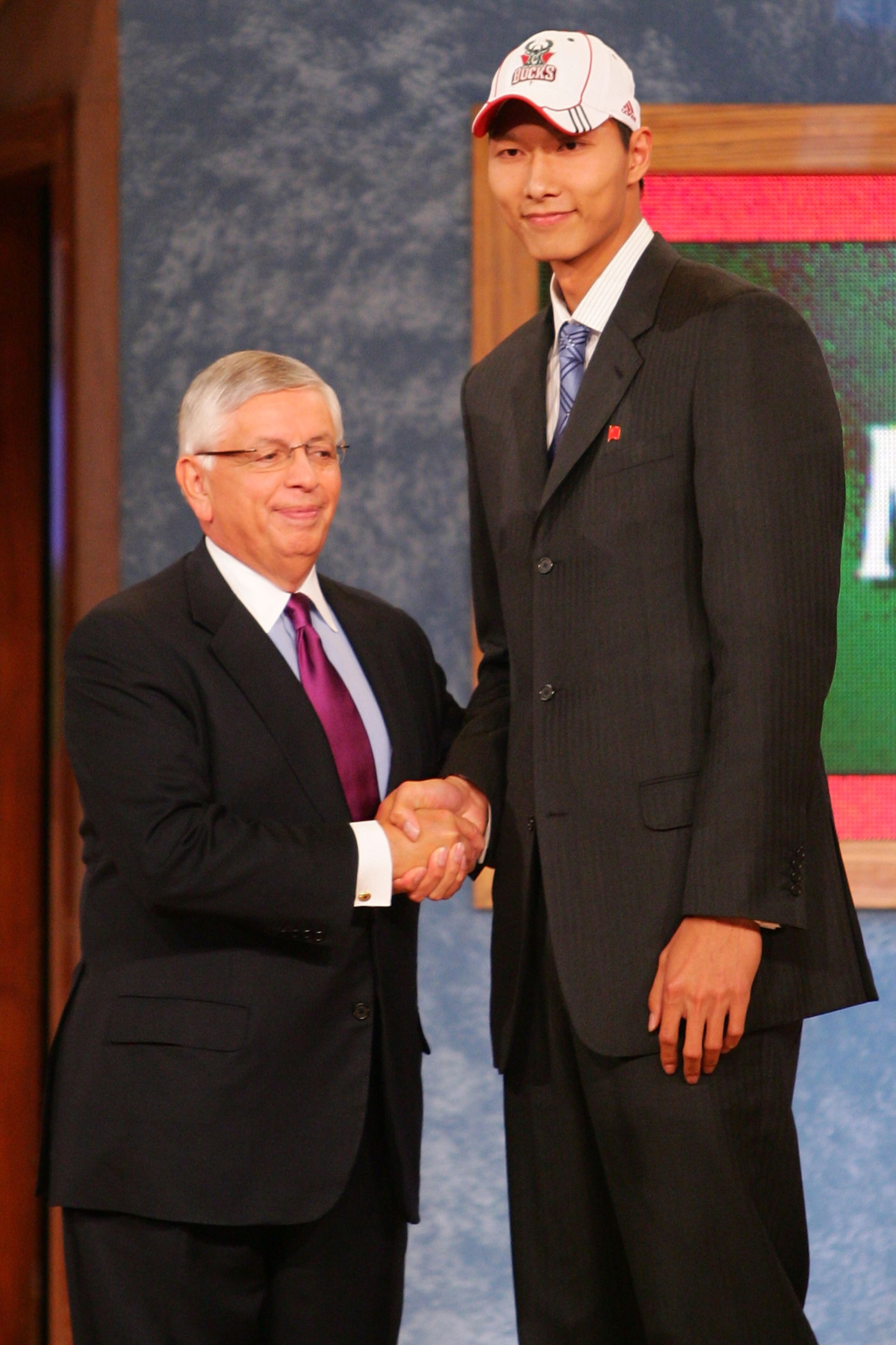 NEW YORK - JUNE 28:  NBA Commissioner David Stern (L) shakes hands with Yi Jianlian after he was drafted sixth by the Milwaukee Bucks during the 2007 NBA Draft at the WaMu Theatre at Madison Square Garden June 28, 2007 in New York City. NOTE TO USER: User