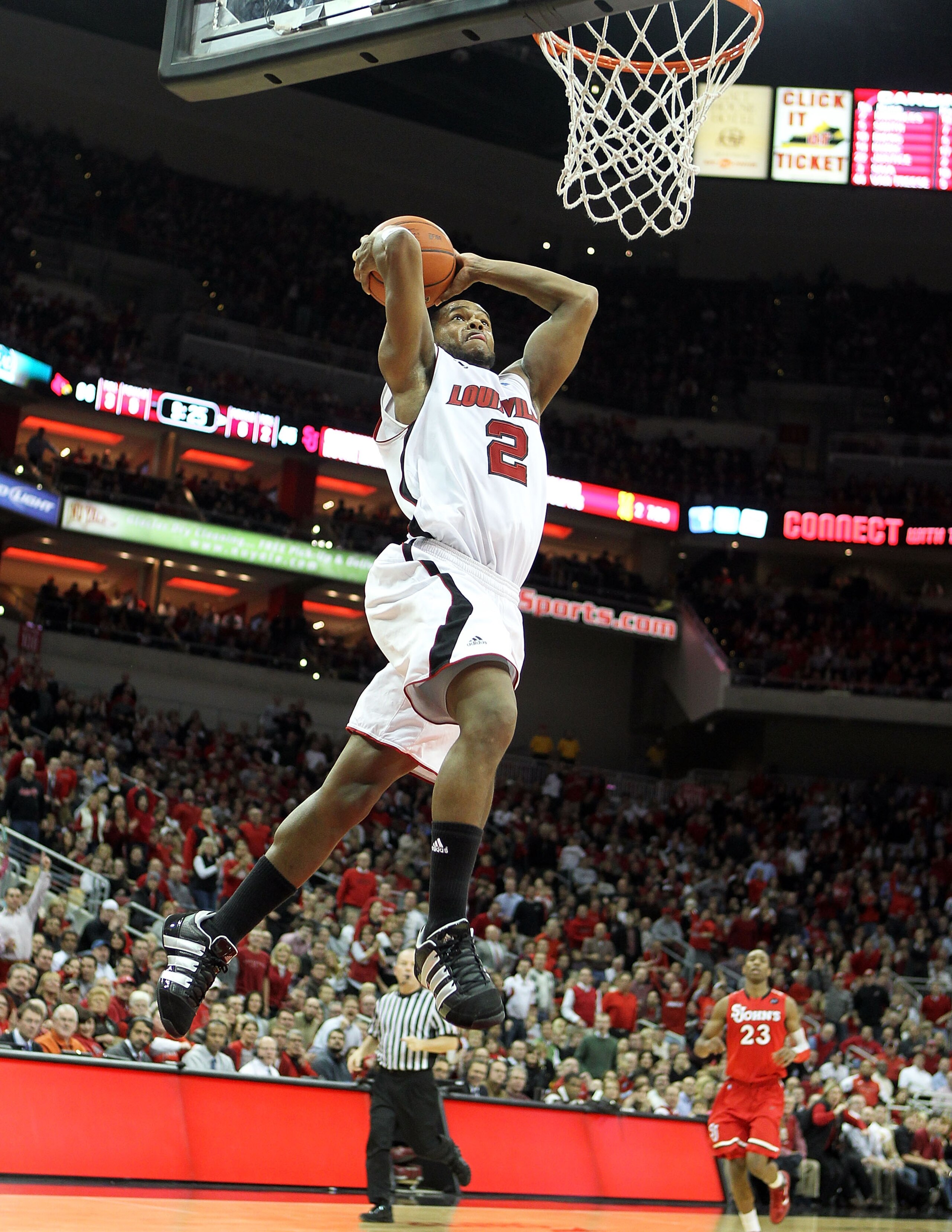 LOUISVILLE, KY - JANUARY 19:  Preston Knowles #2 of the Louisville Cardinals dunks the ball during the Big East Conference game against the St. John's Red Storm at the KFC Yum! Center on January 19, 2011 in Louisville, Kentucky.  Louisville won 88-63.  (P