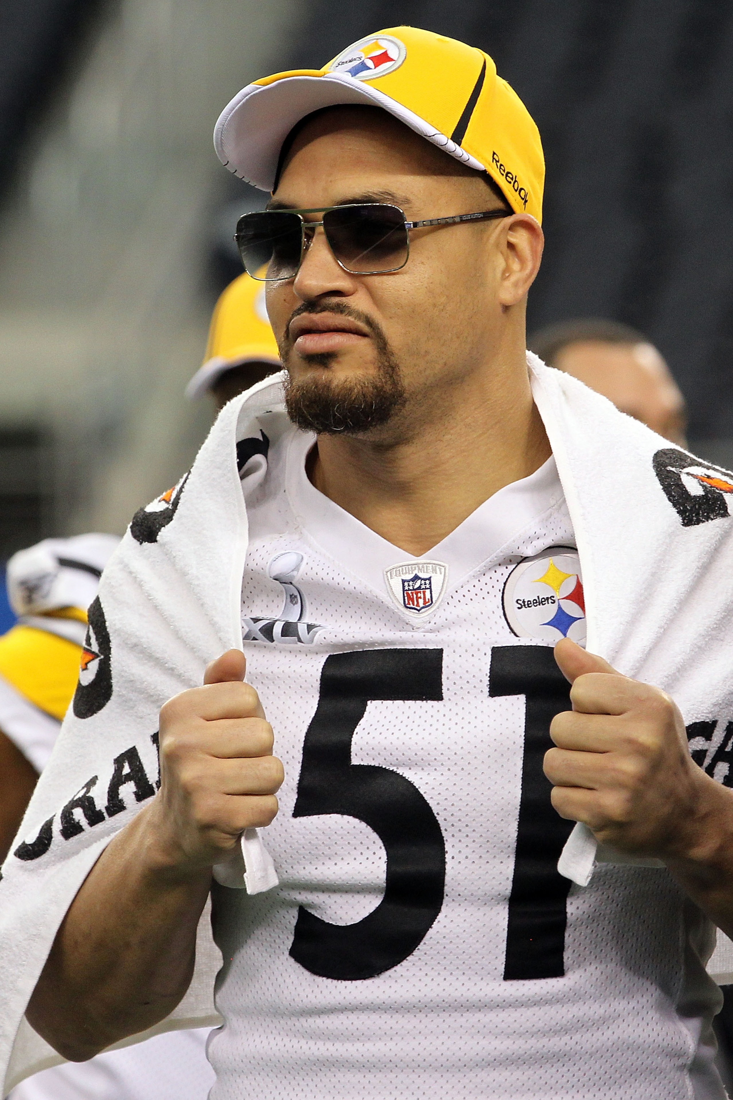 ARLINGTON, TX - FEBRUARY 01:  James Farrior #51 of the Pittsburgh Steelers looks on during Super Bowl XLV Media Day ahead of Super Bowl XLV at Cowboys Stadium on February 1, 2011 in Arlington, Texas. The Pittsburgh Steelers will play the Green Bay Packers
