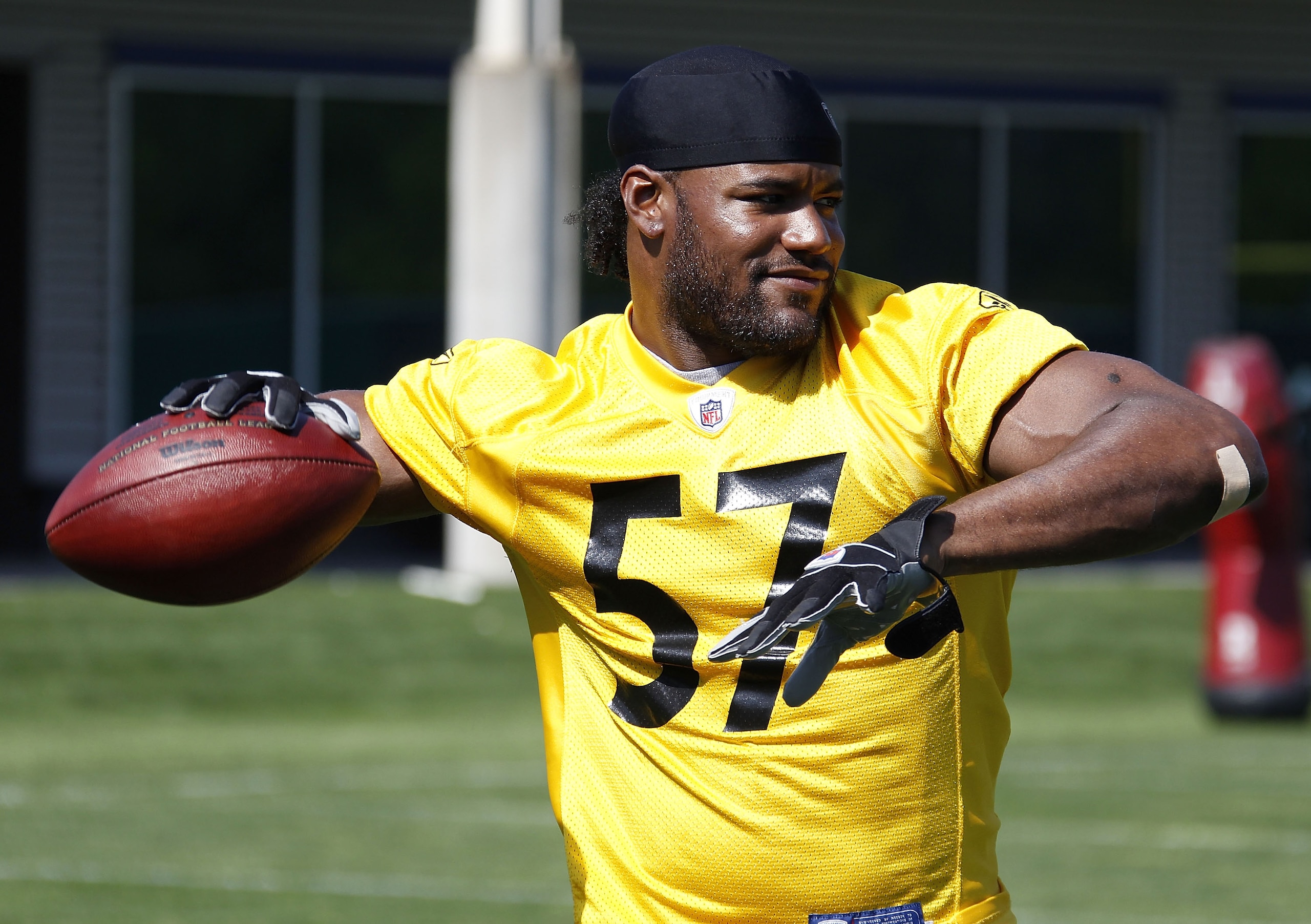 PITTSBURGH - APRIL 30:  Keyaron Fox #57 of the Pittsburgh Steelers throws a pass during mini camp at the Pittsburgh Steelers Training Facility on April 30, 2010 in Pittsburgh, Pennsylvania.  (Photo by Gregory Shamus/Getty Images)