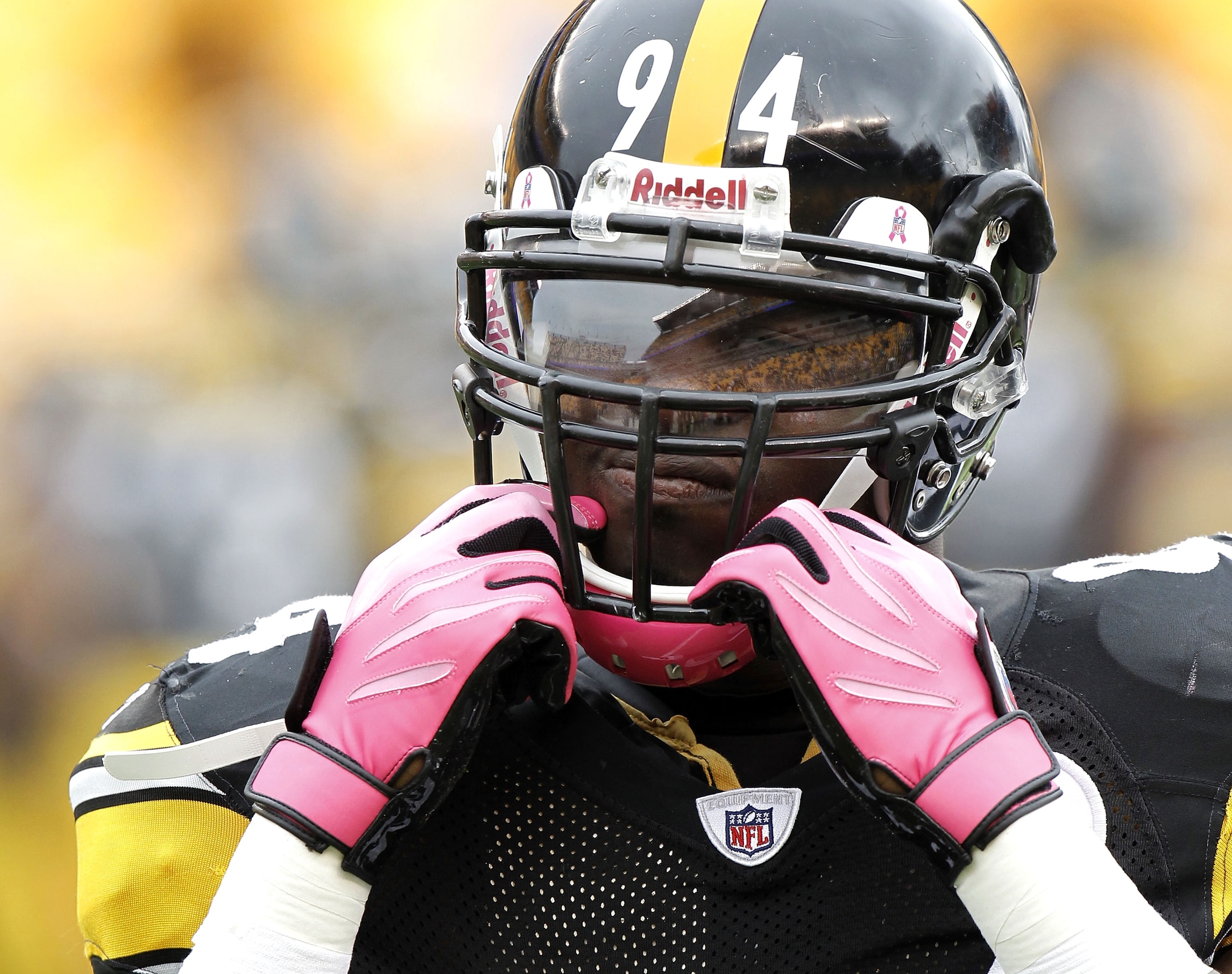 PITTSBURGH - OCTOBER 03:  Lawrence Timmons #94 of the Pittsburgh Steelers wears a pink chin strap and gloves for breast cancer awareness prior to playing the Baltimore Ravens on October 3, 2010 at Heinz Field in Pittsburgh, Pennsylvania.  (Photo by Gregor
