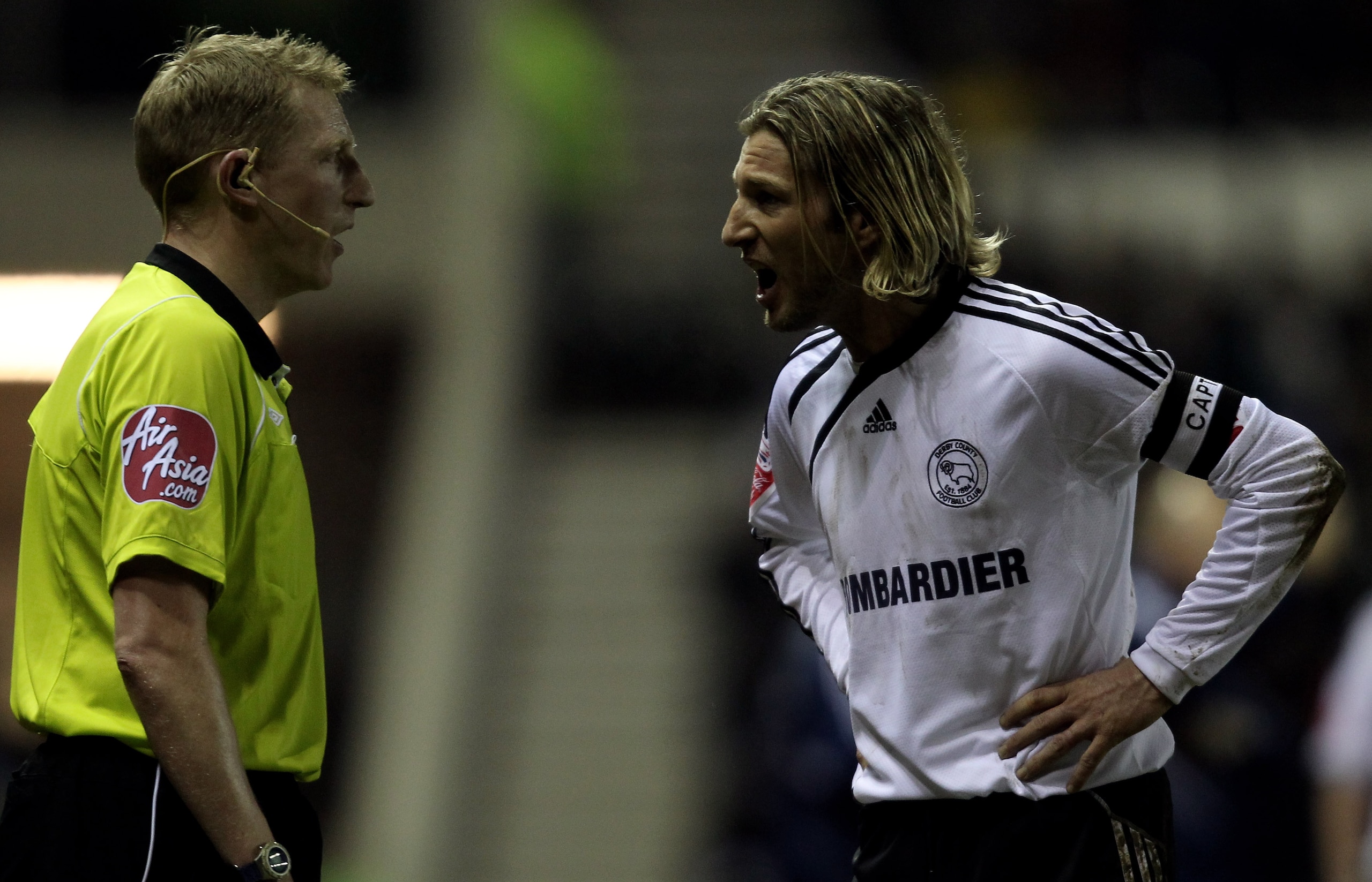 DERBY, ENGLAND - FEBRUARY 16: Robbie Savage of Derby makes his point to the assistant referee during the Coca Cola Championship match between Derby County and Preston North End at Pride Park on February 16, 2010 in Derby, England.  (Photo by Ross Kinnaird