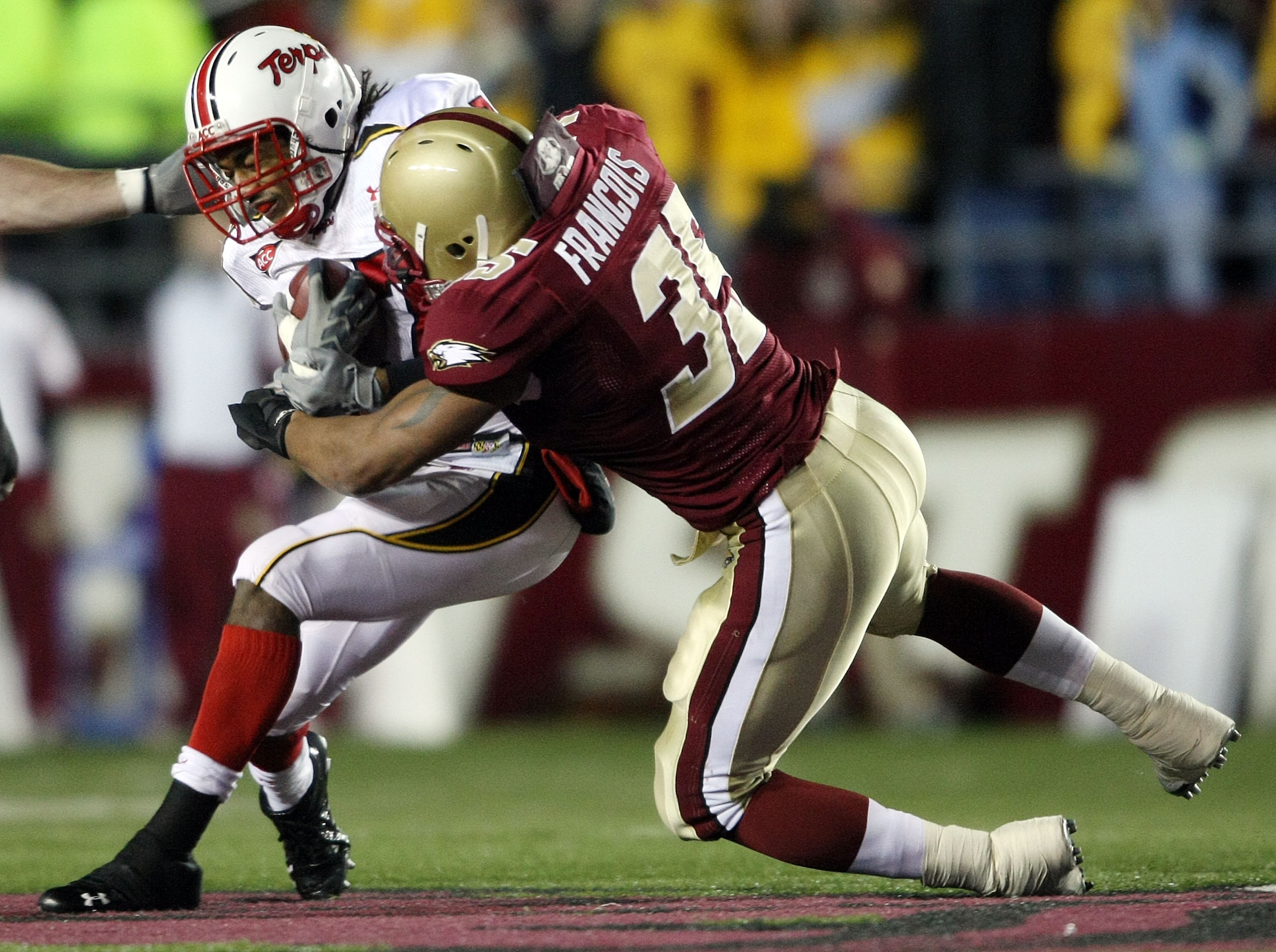 CHESTNUT HILL, MA - NOVEMBER 29:  Danny Oquendo #17 of the Maryland Terrapins is taken down by Robert Francois #35 of the Boston College Eagles on November 29, 2008 at Alumni Stadium in Chestnut Hill, Massachusetts. Boston College defeated Maryland 28-21.