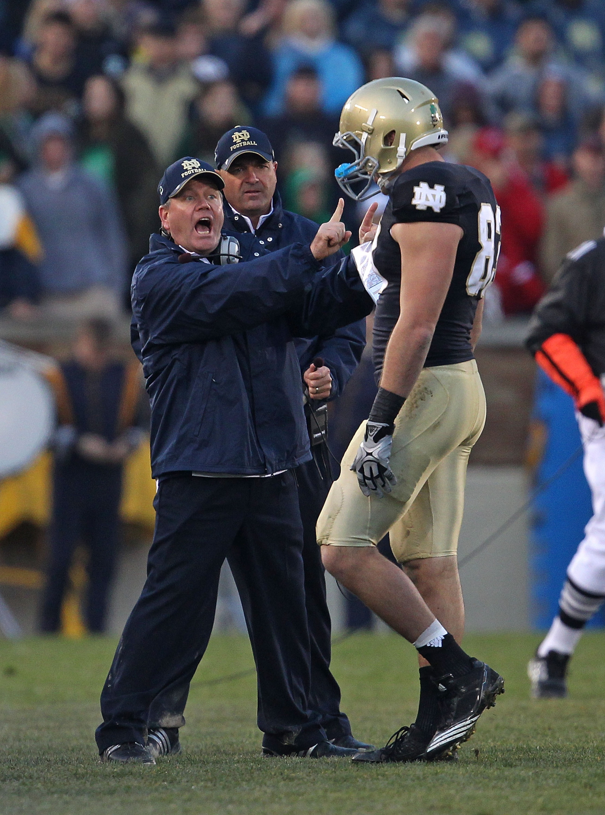 SOUTH BEND, IN - NOVEMBER 13: Head coach Brian Kelly of the Notre Dame Fighting Irish yells at Mike Ragone #83 during a game against the Utah Utes at Notre Dame Stadium on November 13, 2010 in South Bend, Indiana. Notre Dame defeated Utah 28-3.  (Photo by