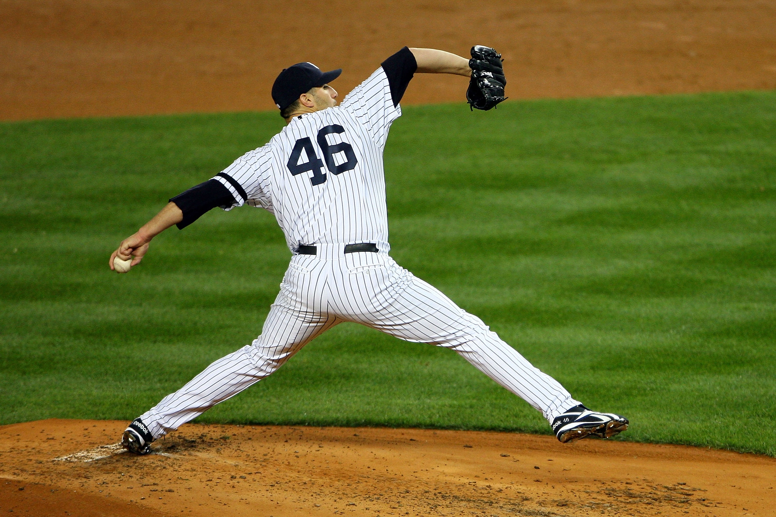 NEW YORK - OCTOBER 18: Starting pitcher Andy Pettitte #46 of the New York Yankees pitches against the Texas Rangers in Game Three of the ALCS during the 2010 MLB Playoffs at Yankee Stadium on October 18, 2010 in New York, New York. (Photo by Andrew Burt NEW YORK - OCTOBER 18: Starting pitcher Andy Pettitte #46 of the New York Yankees pitches against the Texas Rangers in Game Three of the ALCS during the 2010 MLB Playoffs at Yankee Stadium on October 18, 2010 in New York, New York. (Photo by Andrew Burt