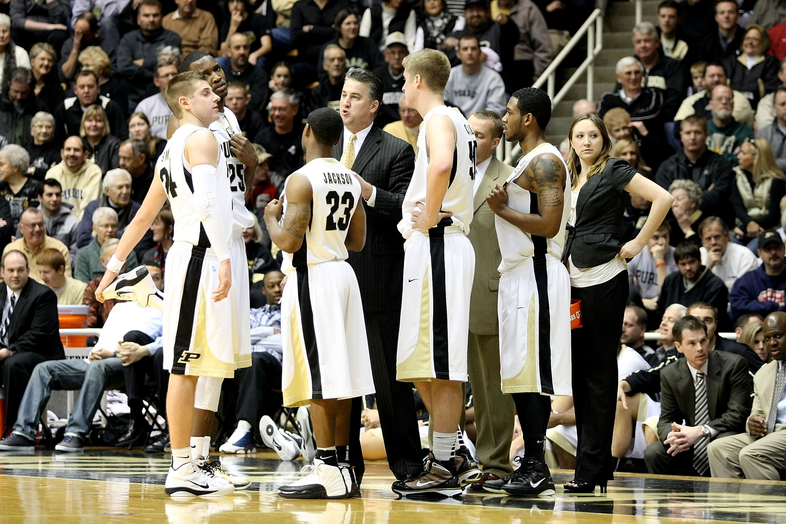 WEST LAFAYETTE, IN - JANUARY 09: Head coach Matt Painter of the Purdue Boilermakers talks with with his players during a timeout against the Iowa Hawkeyes at Mackey Arena on January 9, 2011 in West Lafayette, Indiana. Purdue won 17-16. (Photo by Chris Ch WEST LAFAYETTE, IN - JANUARY 09: Head coach Matt Painter of the Purdue Boilermakers talks with with his players during a timeout against the Iowa Hawkeyes at Mackey Arena on January 9, 2011 in West Lafayette, Indiana. Purdue won 17-16. (Photo by Chris Ch