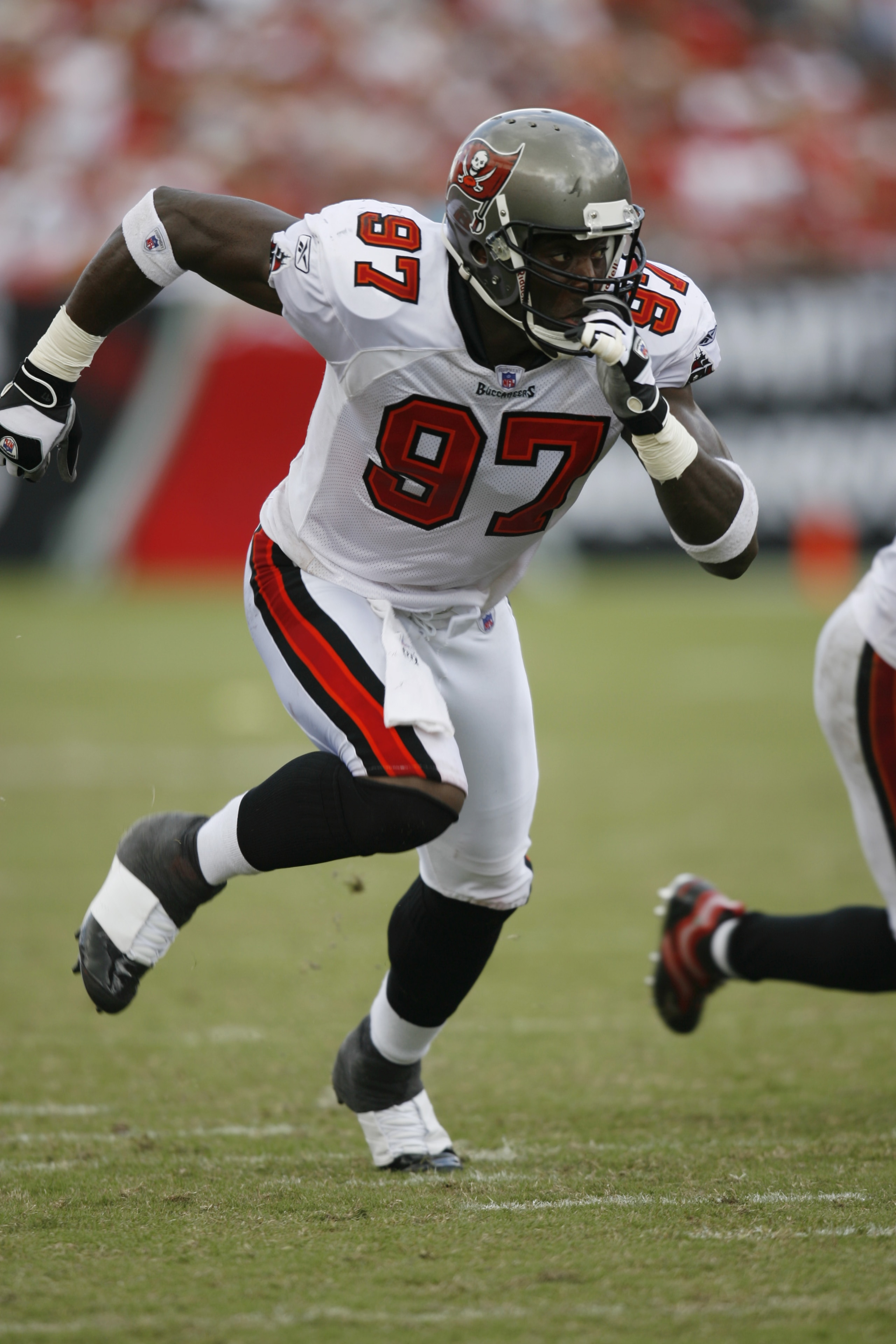 TAMPA, FL - SEPTEMBER 10:  Defensive end Simeon Rice #97 of the Tampa Bay Buccaneers runs against the Baltimore Ravens during their NFL game on September 10, 2006 at Raymond James Stadium in Tampa, Florida.  The Ravens defeated the Buccaneers 27-0.  (Phot
