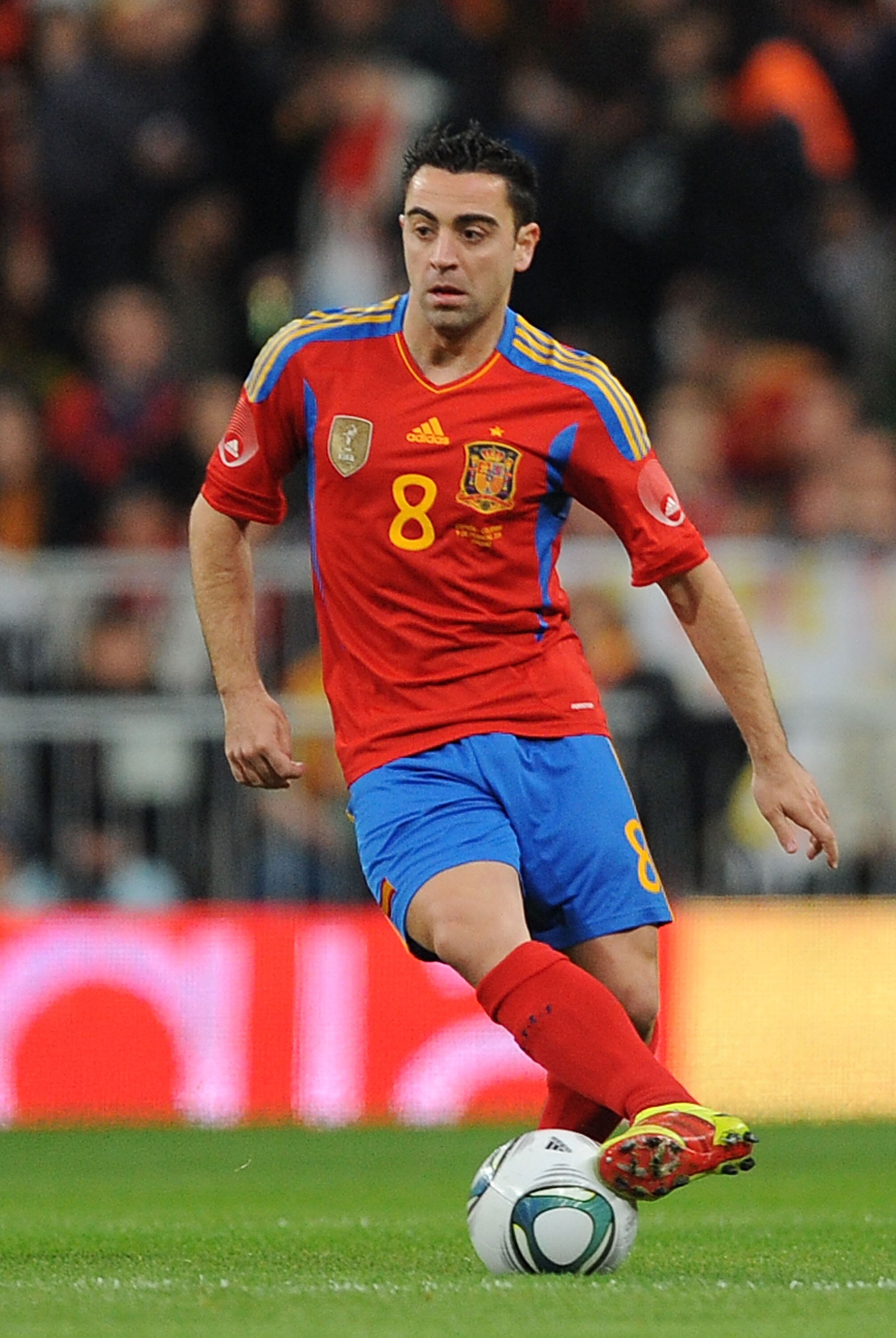 MADRID, SPAIN - FEBRUARY 09:   Xavi Hernandez of Spain in action during the International friendly match between Spain and Colombia at Estadio Santiago Bernabeu on February 9, 2011 in Madrid, Spain.  (Photo by Denis Doyle/Getty Images)