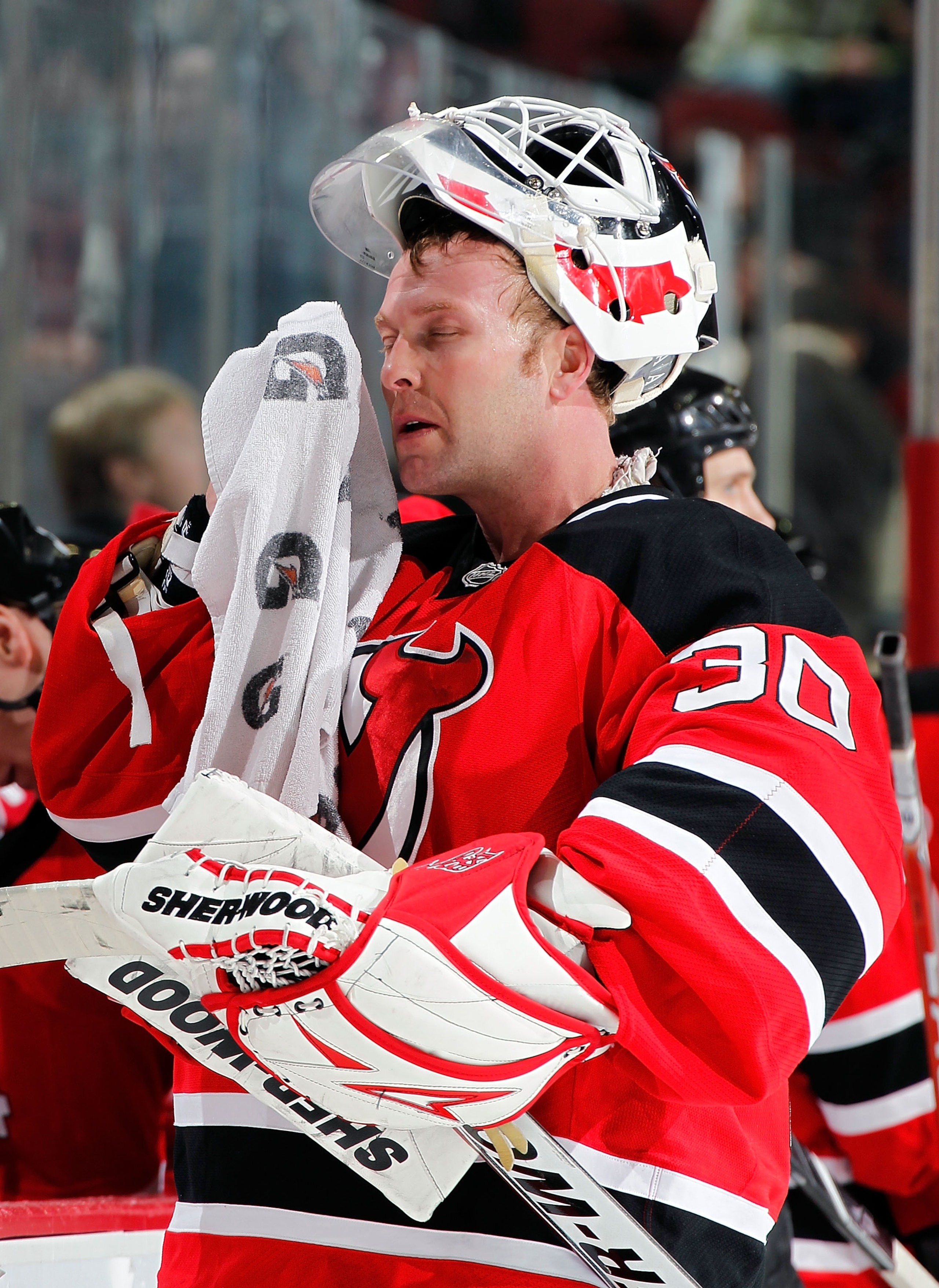 NEWARK, NJ - JANUARY 20:  Goalie Martin Brodeur #30 of the New Jersey Devils takes a break during his shutout win in an NHL hockey game against the Pittsburgh Penguins at the Prudential Center on January 20, 2011 in Newark, New Jersey.  (Photo by Paul Ber