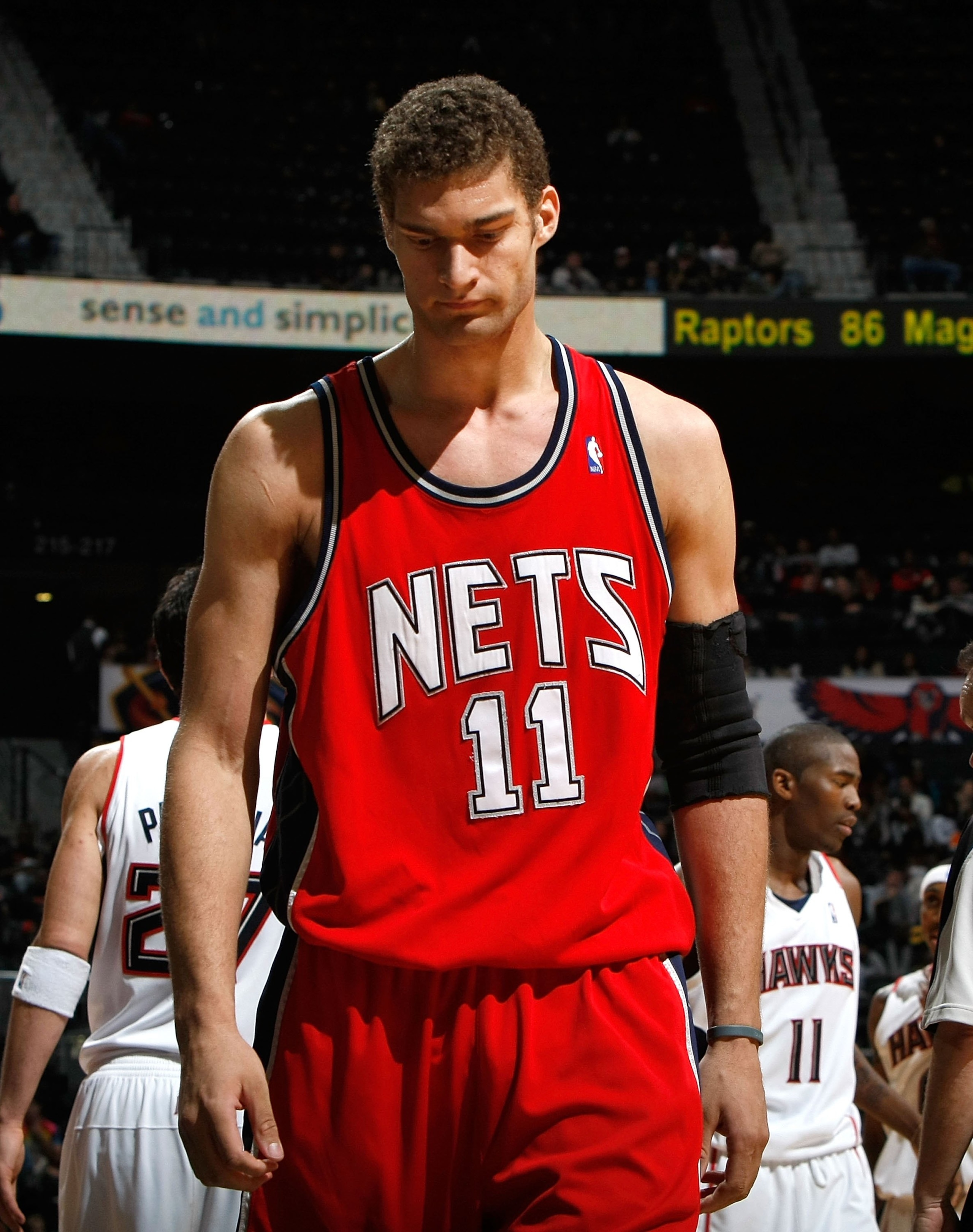 ATLANTA - JANUARY 06:  Brook Lopez #11 of the New Jersey Nets against the Atlanta Hawks at Philips Arena on January 6, 2010 in Atlanta, Georgia.  NOTE TO USER: User expressly acknowledges and agrees that, by downloading and/or using this Photograph, User