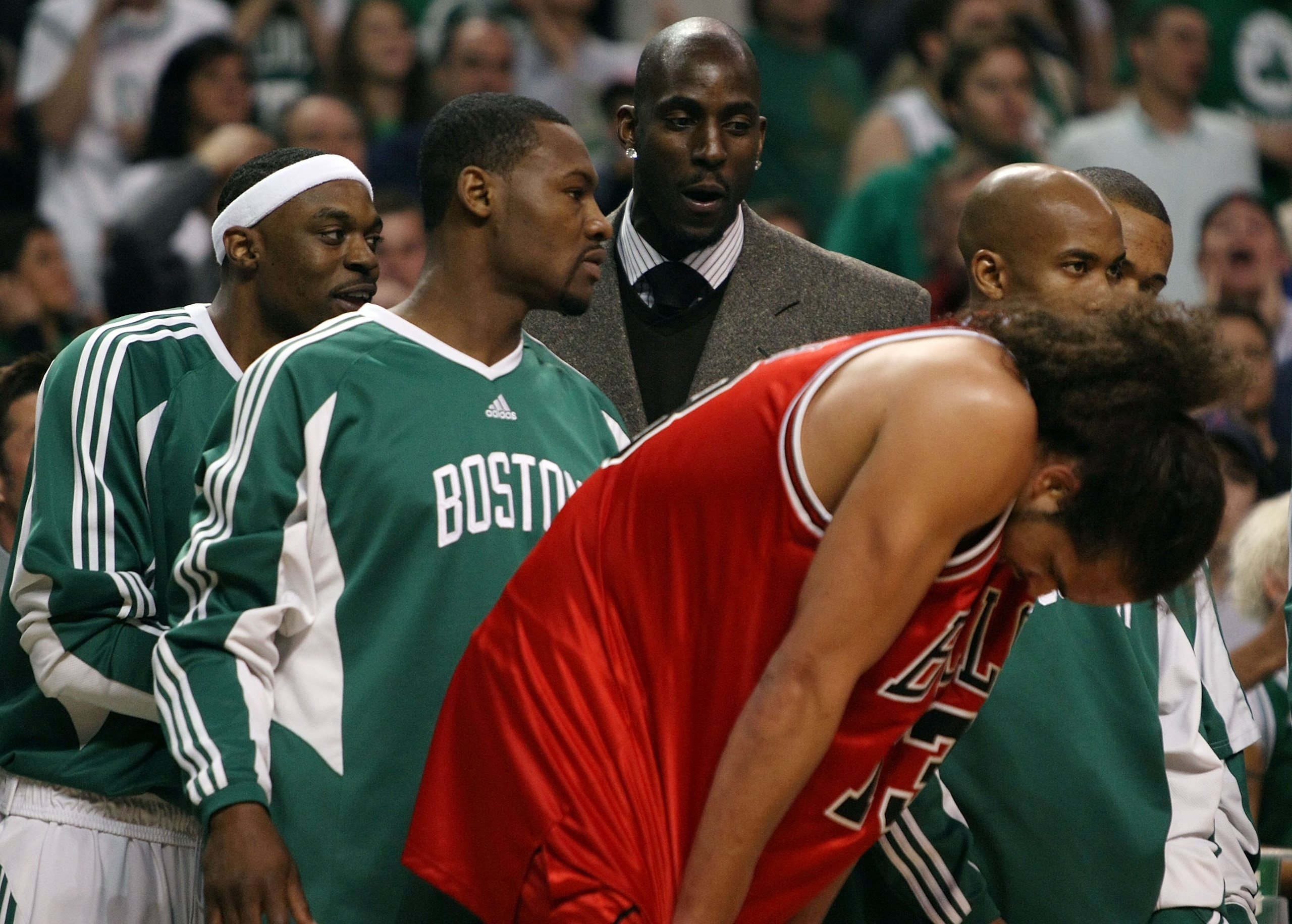 BOSTON - APRIL 20:  Kevin Garnett #5 of the Boston Celtics has a few words for Joakim Noah #13 of the Chicago Bulls in Game Two of the Eastern Conference Quarterfinals during the 2009 NBA Playoffs at TD Banknorth Garden on April 20, 2009 in Boston, Massac