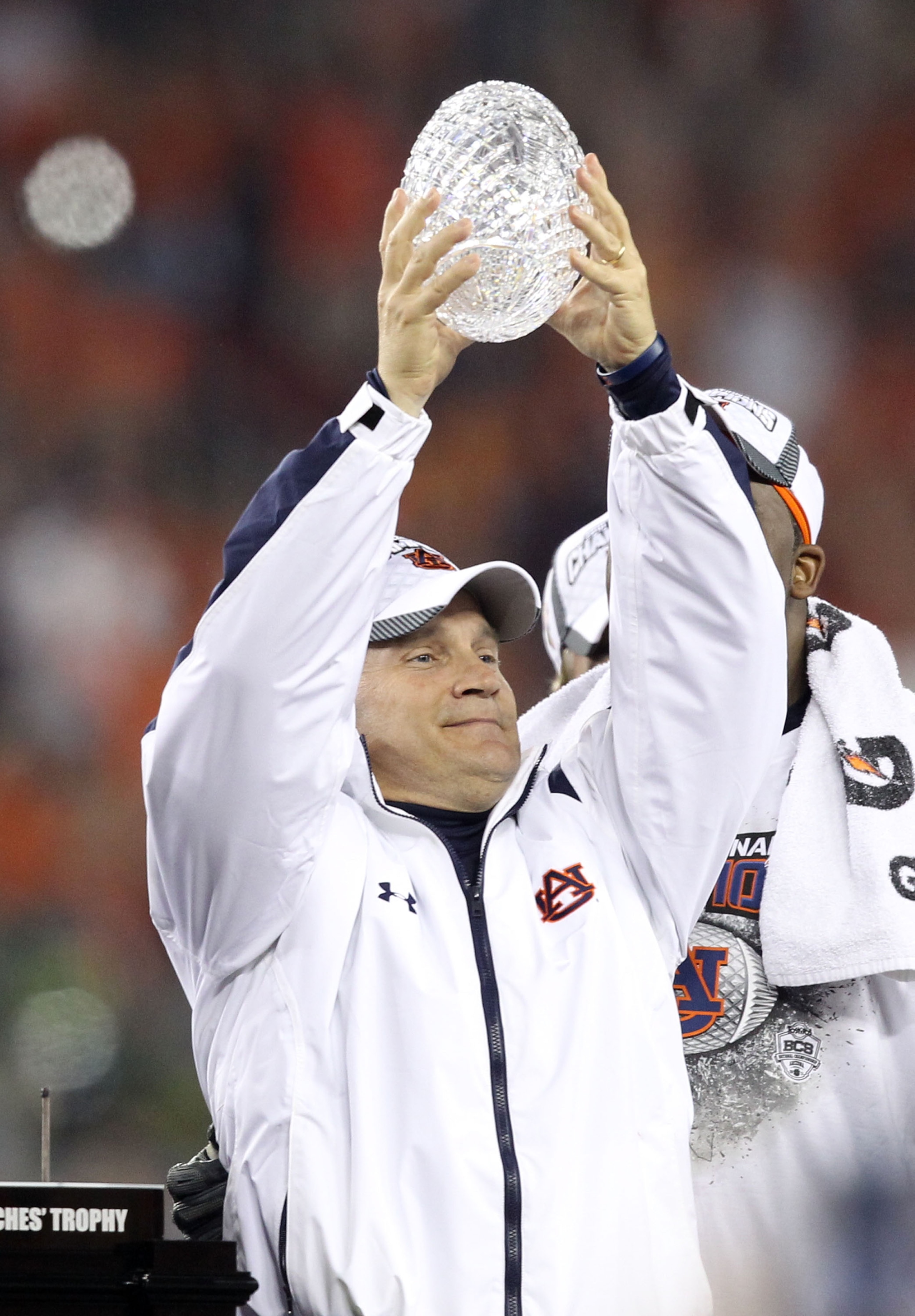 GLENDALE, AZ - JANUARY 10: Head coach Gene Chizik of the Auburn Tigers celebrates the Tigers 22-19 victory against the Oregon Ducks during the Tostitos BCS National Championship Game at University of Phoenix Stadium on January 10, 2011 in Glendale, Arizo GLENDALE, AZ - JANUARY 10: Head coach Gene Chizik of the Auburn Tigers celebrates the Tigers 22-19 victory against the Oregon Ducks during the Tostitos BCS National Championship Game at University of Phoenix Stadium on January 10, 2011 in Glendale, Arizo