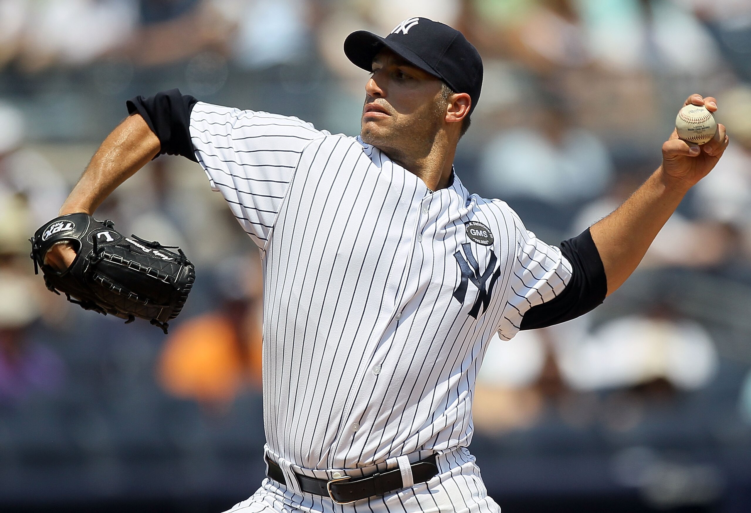 NEW YORK - JULY 18:  Andy Pettitte #46 of the New York Yankees delivers a pitch against the Tampa Bay Rays on July 18, 2010 at Yankee Stadium in the Bronx borough of New York City.  (Photo by Jim McIsaac/Getty Images)