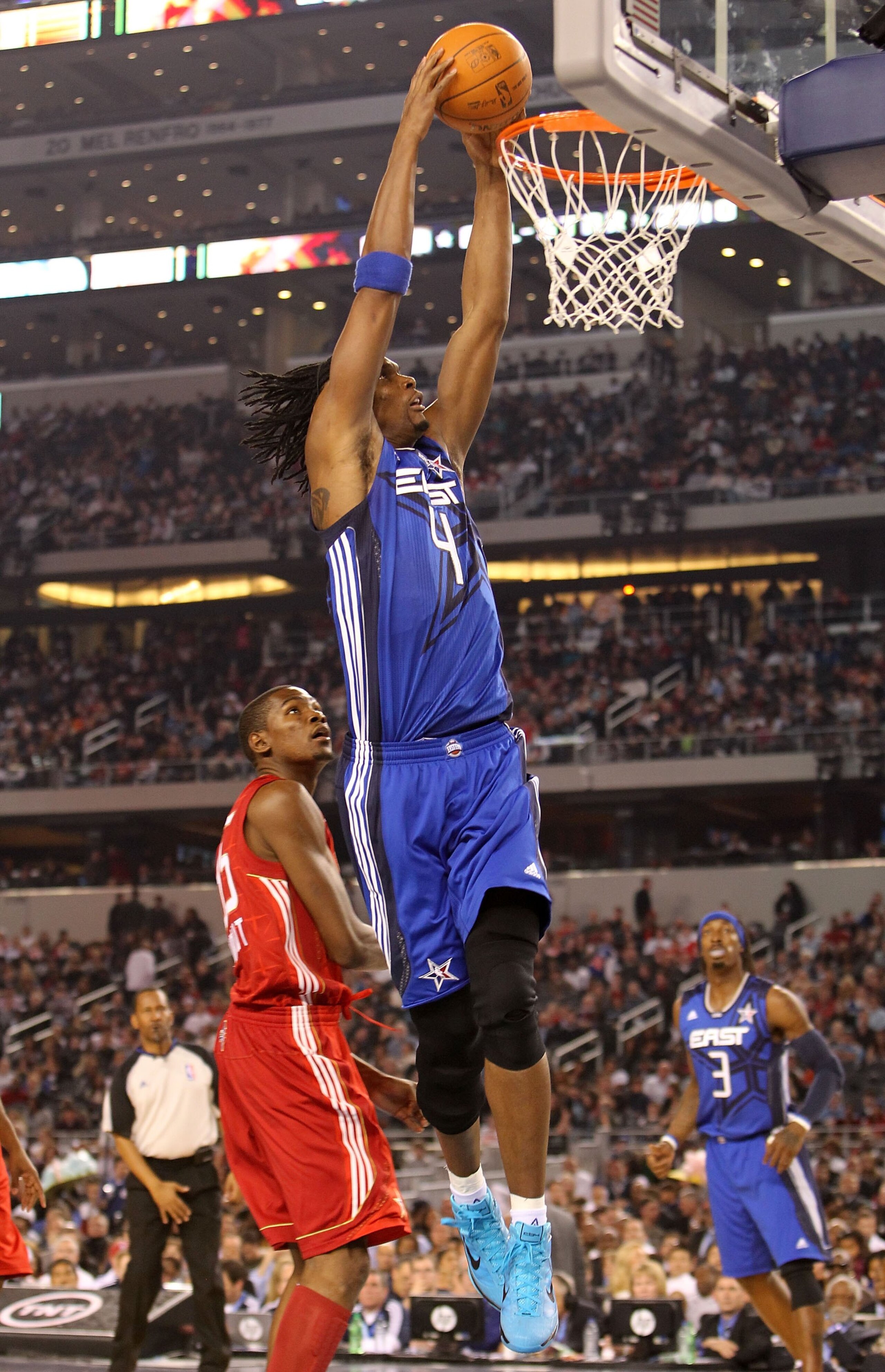 ARLINGTON, TX - FEBRUARY 14:  Chris Bosh #4 of the Eastern Conference shoots against Kevin Durant #35 of the Western Conference during the NBA All-Star Game, part of 2010 NBA All-Star Weekend at Cowboys Stadium on February 14, 2010 in Arlington, Texas. Th