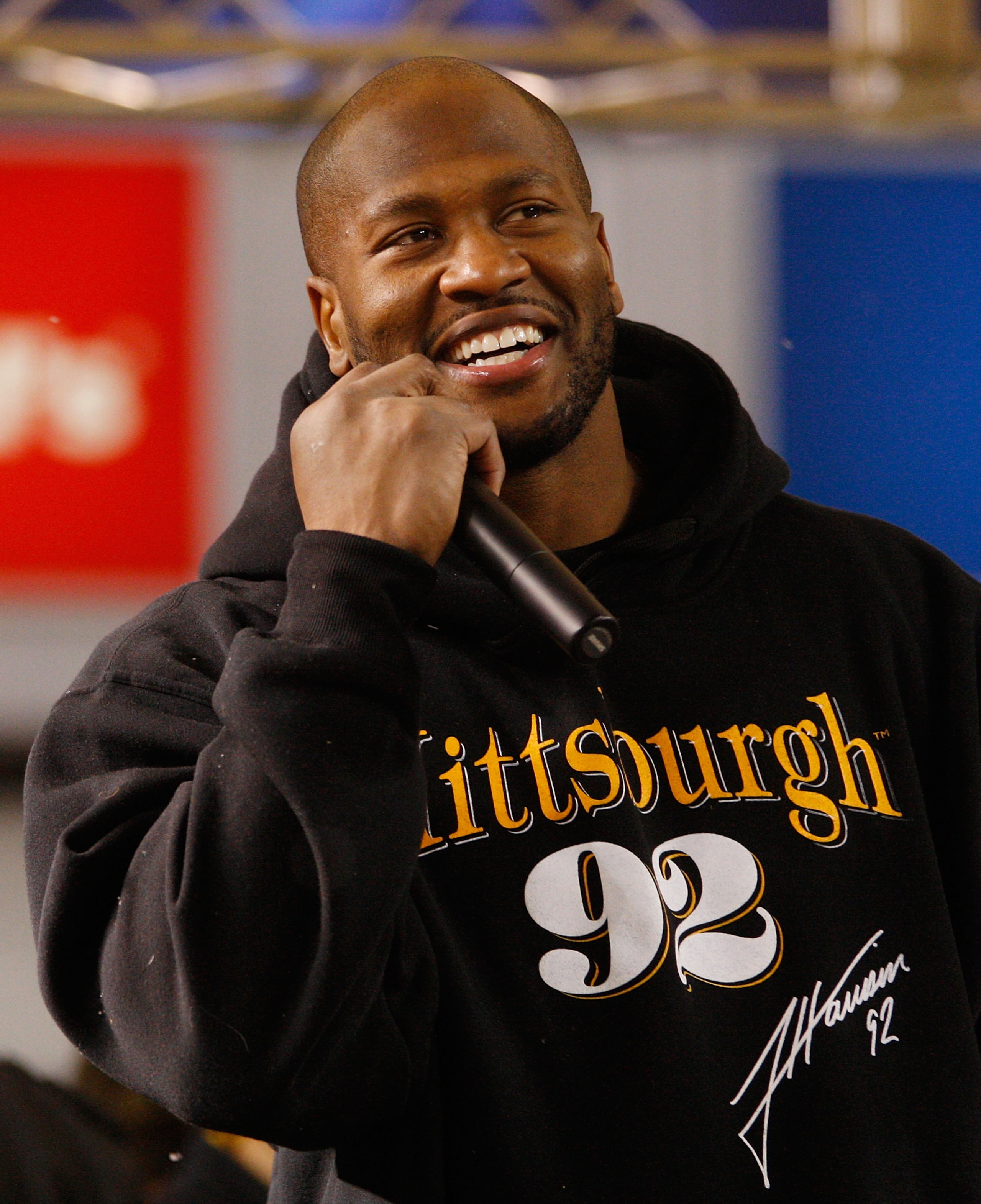 PITTSBURGH - JANUARY 28:  James Harrison #92 of the Pittsburgh Steelers talks to fans during the Super Bowl XLV Pep Rally on January 28, 2011 at Heinz Field in Pittsburgh, Pennsylvania.  (Photo by Jared Wickerham/Getty Images)
