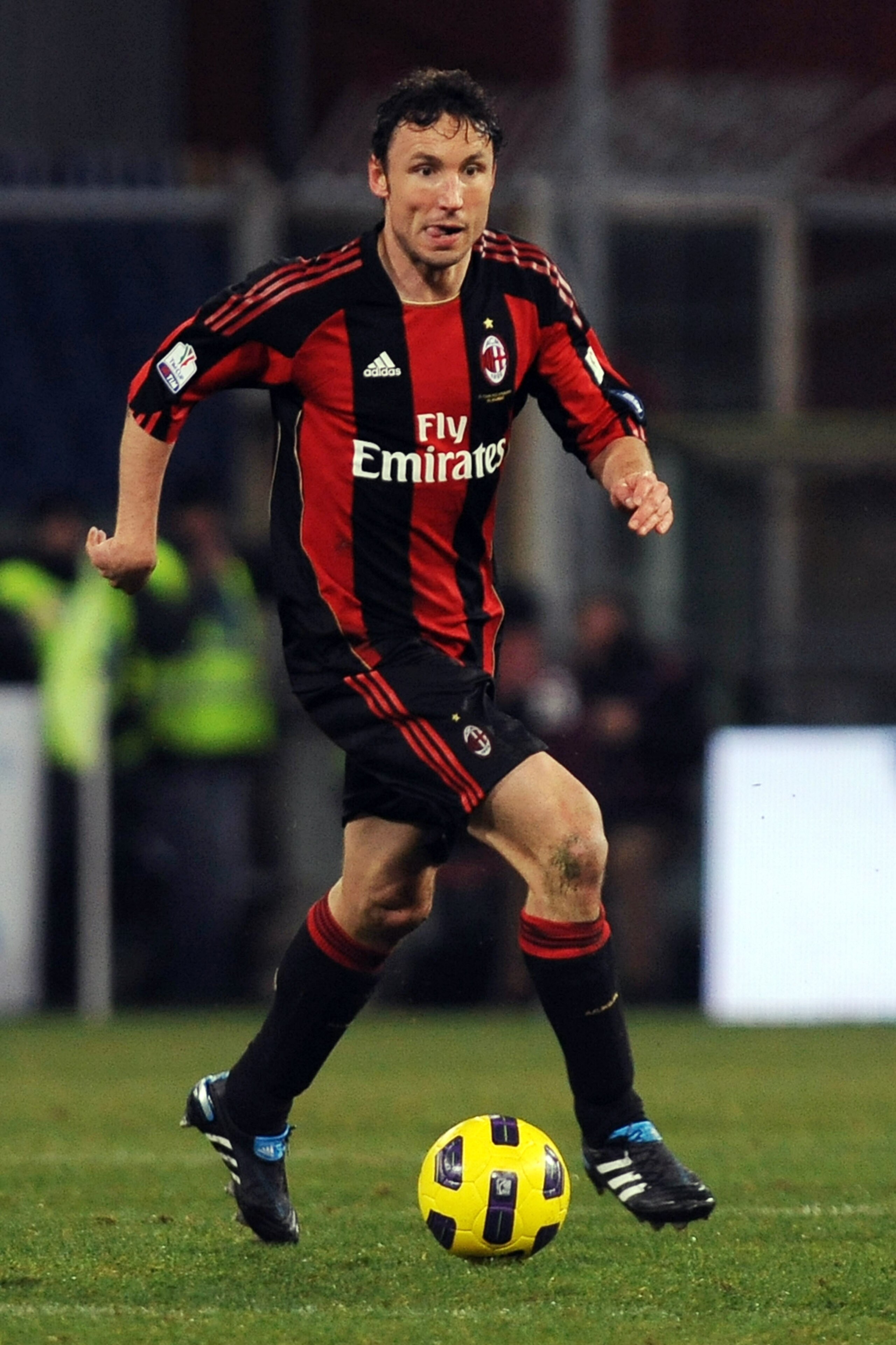 GENOA, ITALY - JANUARY 26:  Mark van Bommel of AC Milan in action during the Tim Cup match between UC Sampdoria and AC Milan at Luigi Ferraris Stadium on January 26, 2011 in Genoa, Italy.  (Photo by Valerio Pennicino/Getty Images)
