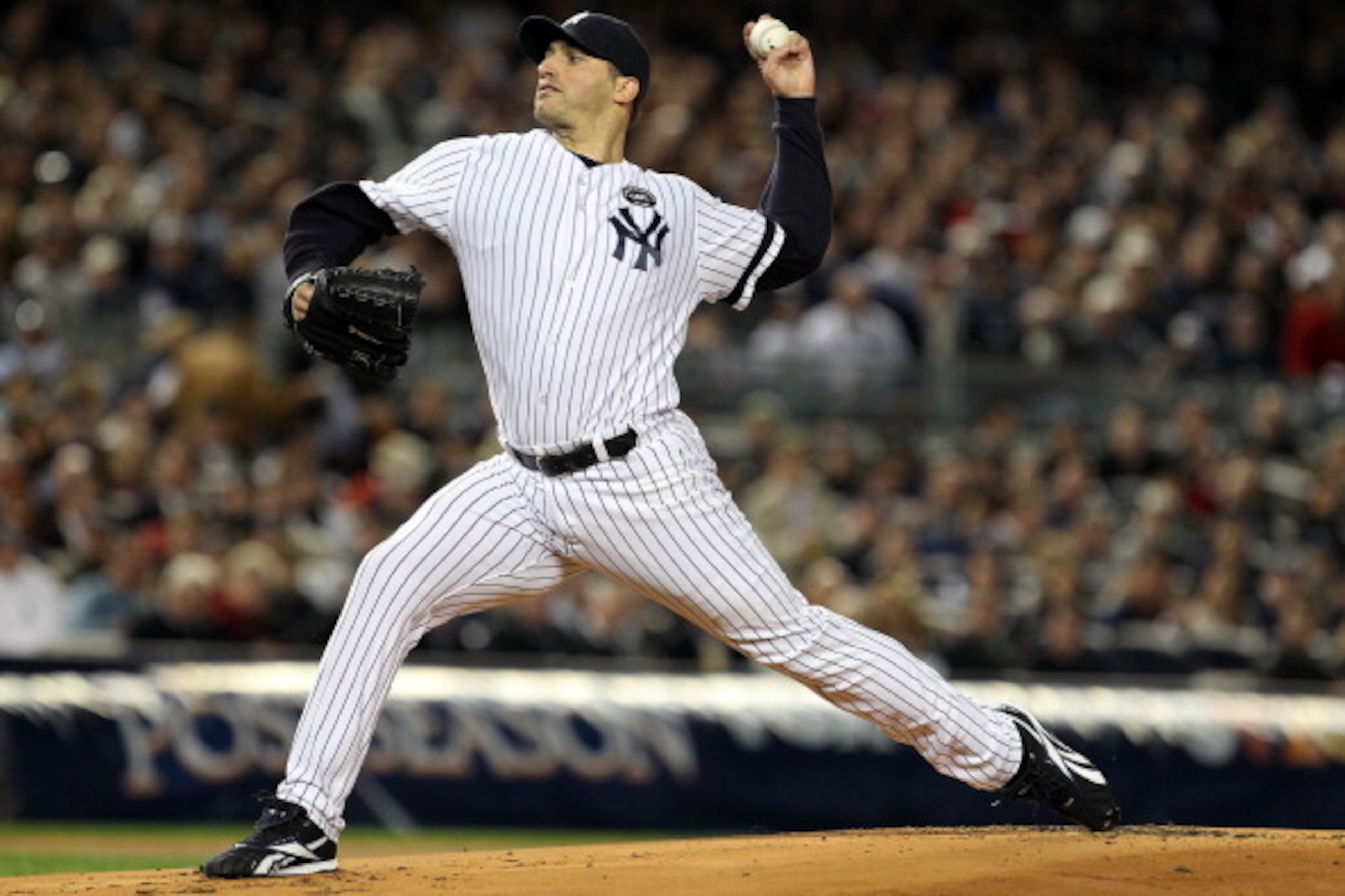NEW YORK - OCTOBER 18:  Starting pitcher Andy Pettitte #46 of the New York Yankees against the Texas Rangers in Game Three of the ALCS during the 2010 MLB Playoffs at Yankee Stadium on October 18, 2010 in New York, New York.  (Photo by Al Bello/Getty Imag