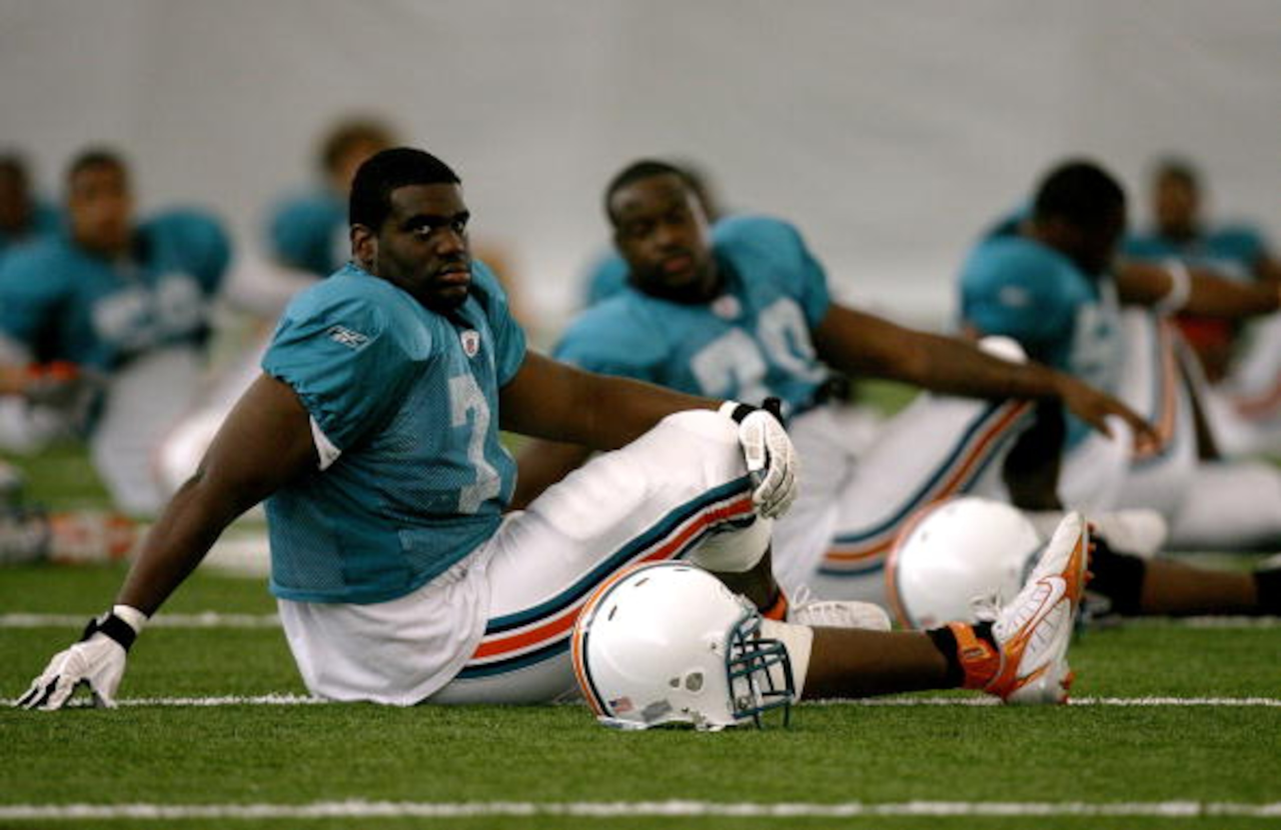 DAVIE, FL - JULY 29:  Defensive end Lionel Dotson #71 of the Miami Dolphins works out during training camp at Nova Southeastern University on July 29, 2008 in Davie, Florida.  (Photo by Doug Benc/Getty Images)