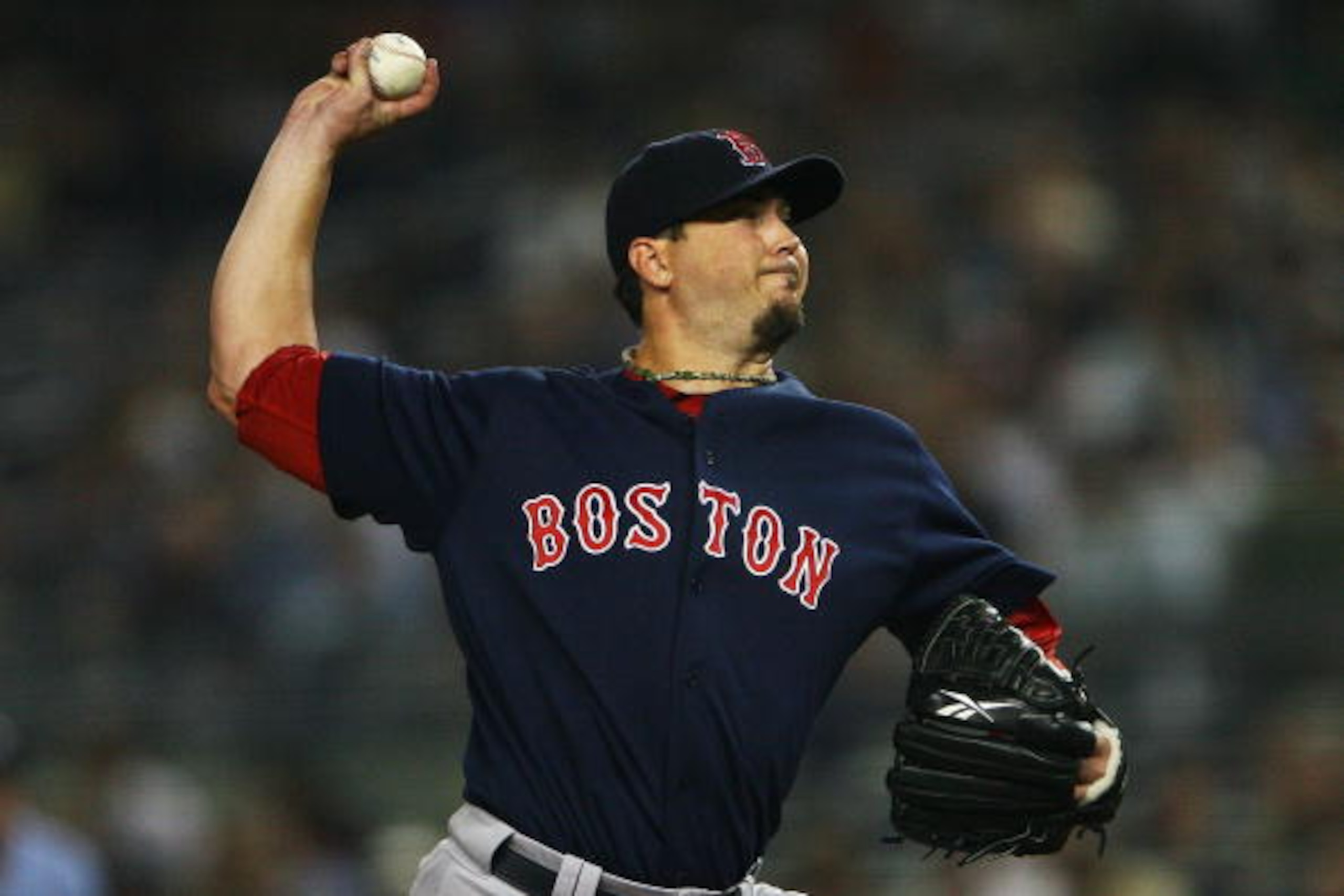 NEW YORK - SEPTEMBER 24:  Josh Beckett #19 of the Boston Red Sox pitches against the New York Yankees on September 24, 2010 at Yankee Stadium in the Bronx borough of New York City.  (Photo by Andrew Burton/Getty Images)