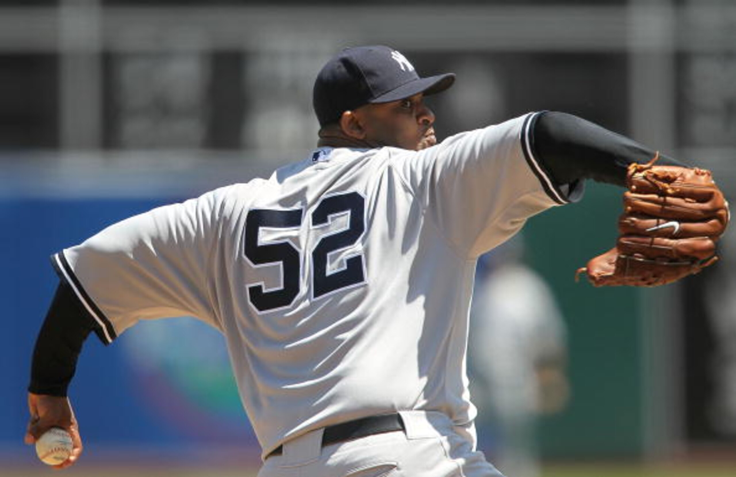 OAKLAND, CA - APRIL 22:  C.C. Sabathia #52 of the New York Yankees pitches during the fourth inning against the Oakland Athletics at the Oakland-Alameda County Coliseum on April 22, 2010 in Oakland, California. The Athletics defeated the Yankees 4-2.  (Ph