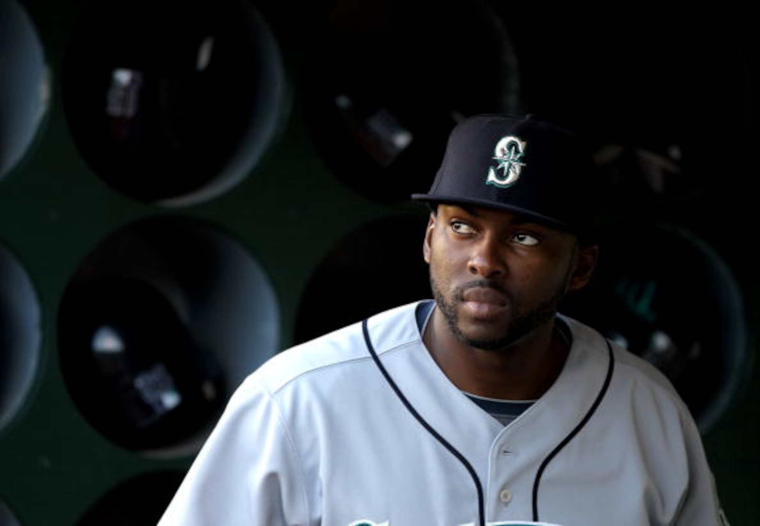 OAKLAND, CA - APRIL 06:  Milton Bradley #15 of the Seattle Mariners stands in the dugout before their game against the Oakland Athletics at the Oakland-Alameda County Coliseum on April 6, 2010 in Oakland, California.  (Photo by Ezra Shaw/Getty Images)