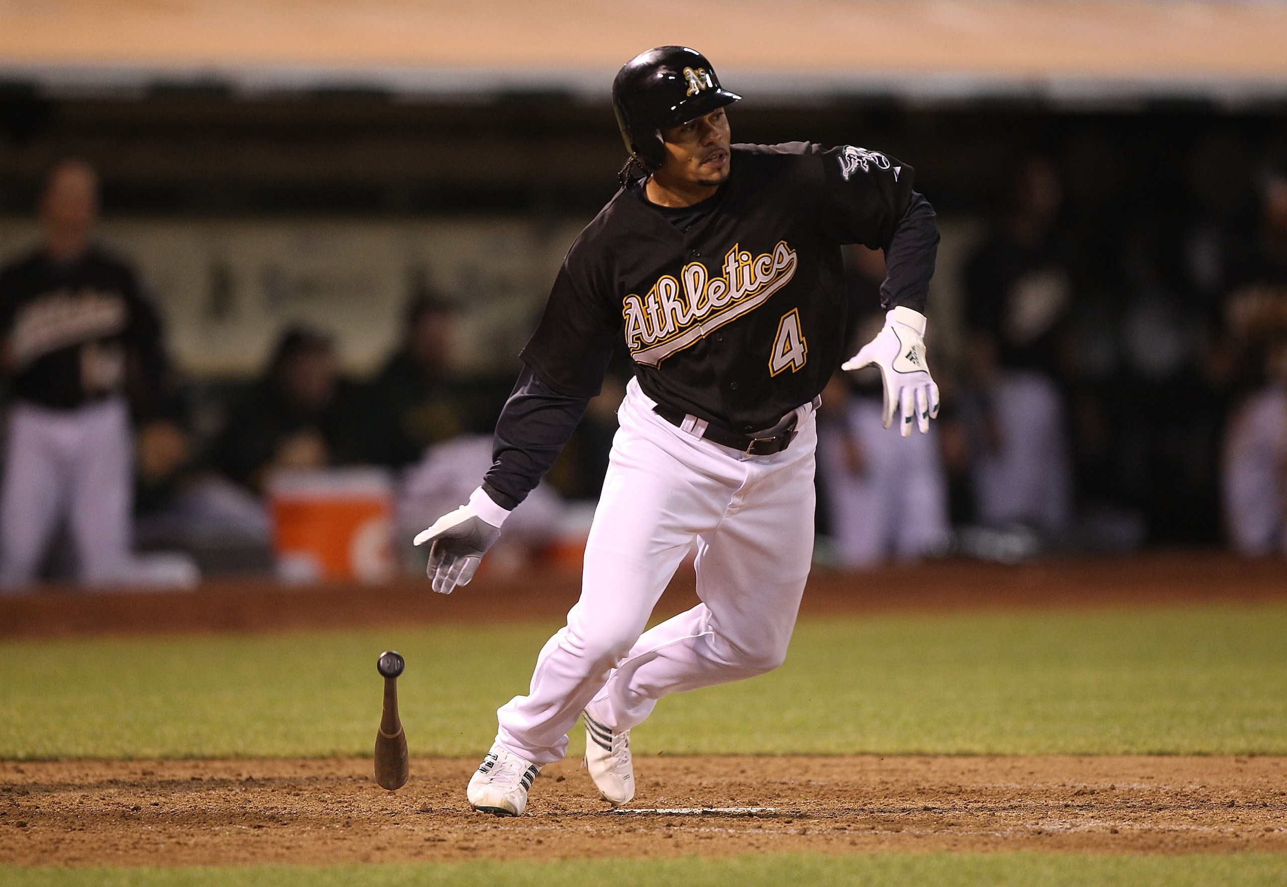 OAKLAND, CA - SEPTEMBER 08:  Coco Crisp #4 of the Oakland Athletics hits an RBI single in the sixth inning against the Seattle Mariners during a Major League Baseball game at the Oakland-Alameda County Coliseum on September 8, 2010 in Oakland, California.