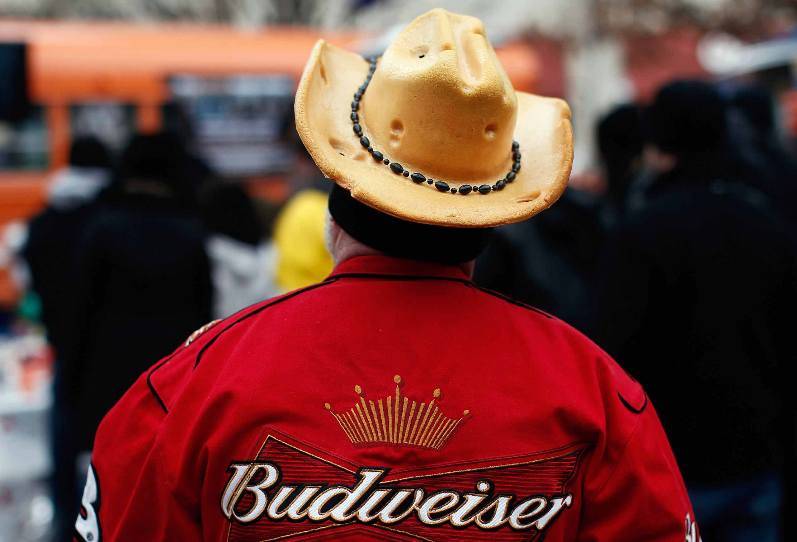 FORT WORTH, TX - FEBRUARY 03:  Fort Worth resident Ronnie Fountain wears a Green Bay Packers 'cheesehead' cowboy hat while touring Sundance Square with other fans February 3, 2011 in Fort Worth, Texas.  Super Bowl XLV will be played February 6, 2011 at Co