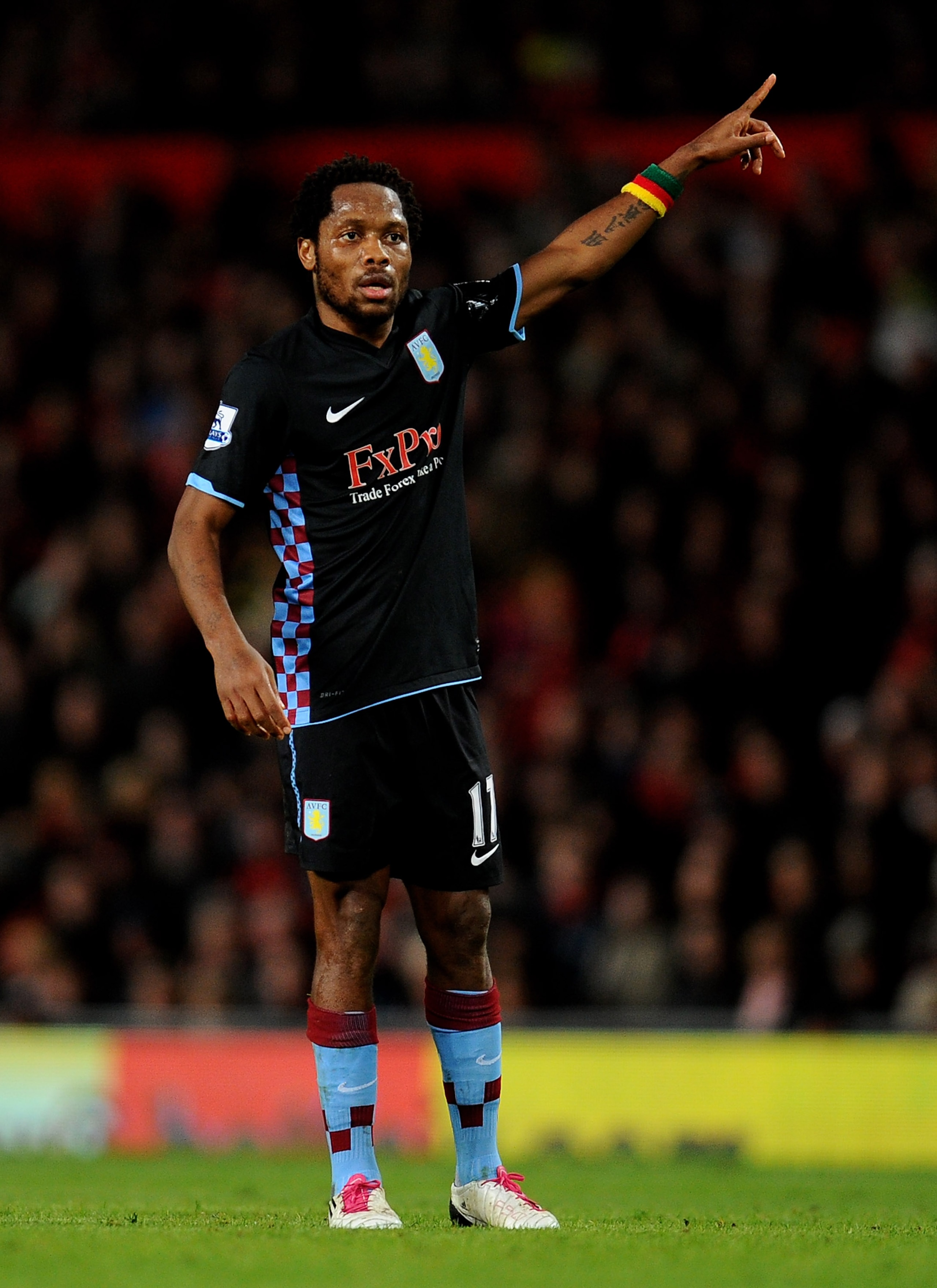 MANCHESTER, ENGLAND - FEBRUARY 01:  Jean Makoun of Aston Villa looks gestures during the Barclays Premier League match between Manchester United and Aston Villa at Old Trafford on February 1, 2011 in Manchester, England.  (Photo by Clive Mason/Getty Image