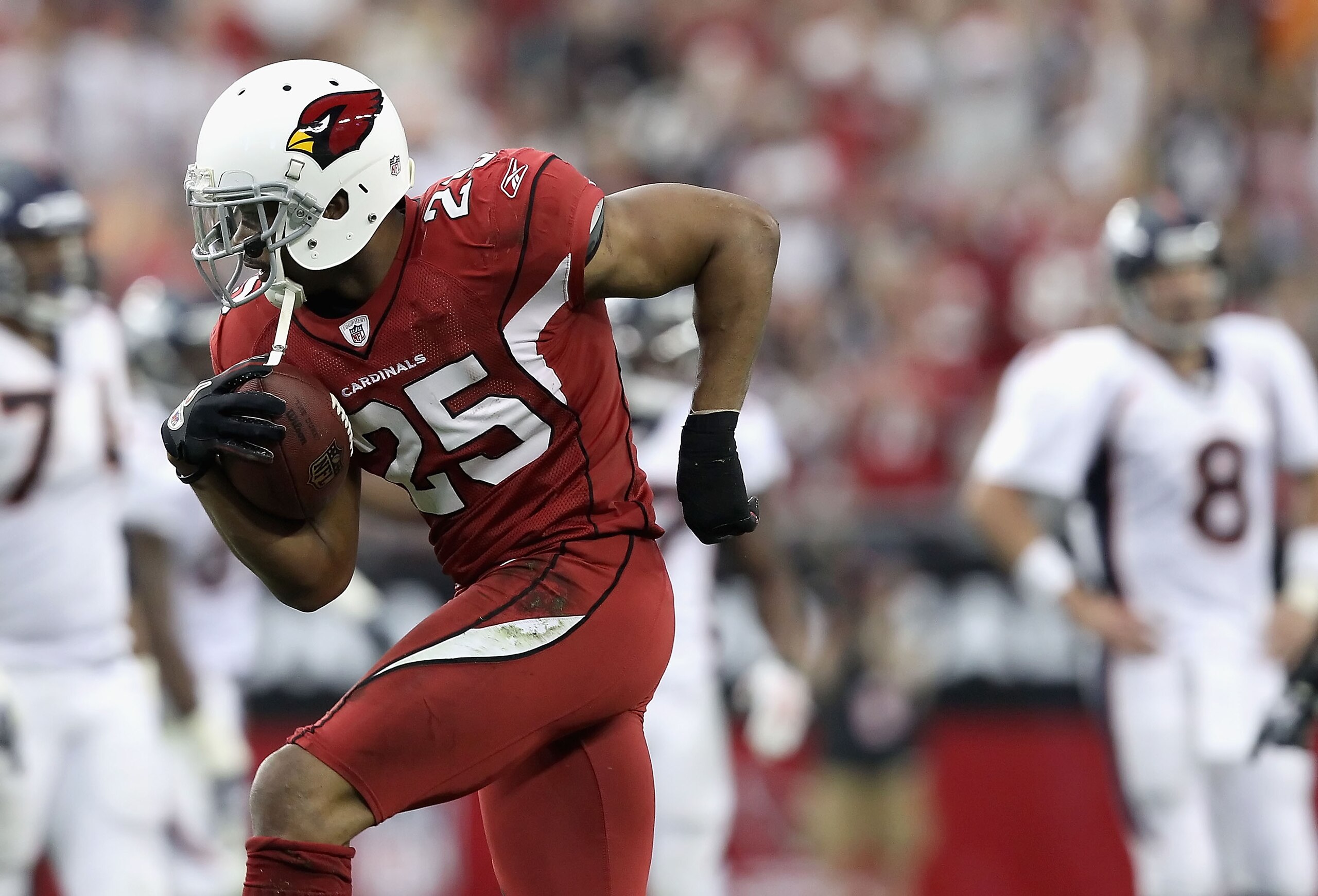 GLENDALE, AZ - DECEMBER 12:  Safety Kerry Rhodes #25 of the Arizona Cardinals reacts after recovering a fumble against the Denver Broncos during the NFL game at the University of Phoenix Stadium on December 12, 2010 in Glendale, Arizona.  The Cardinals de