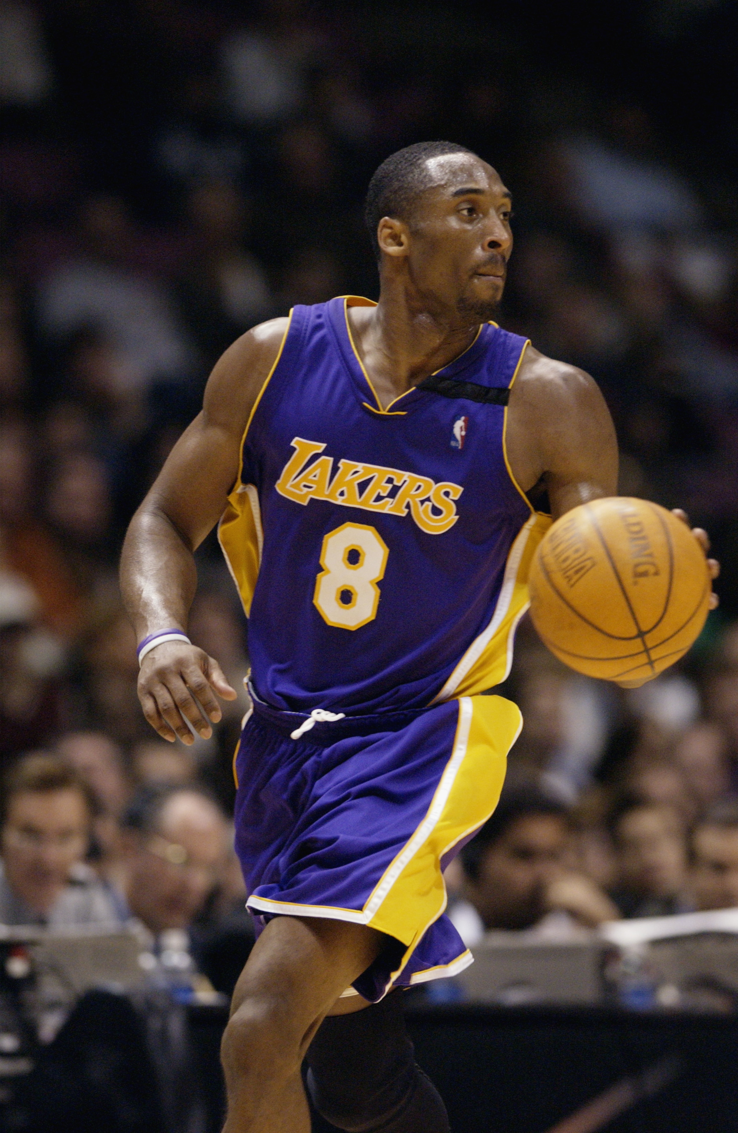 EAST RUTHERFORD, NJ - DECEMBER 19:  Kobe Bryant #8 of the Los Angeles Lakers moves the ball during the NBA game against the New Jersey Nets at Continental Airlines Arena on December 19, 2002 in East Rutherford, New Jersey.  The Nets won 98-71.  NOTE TO US