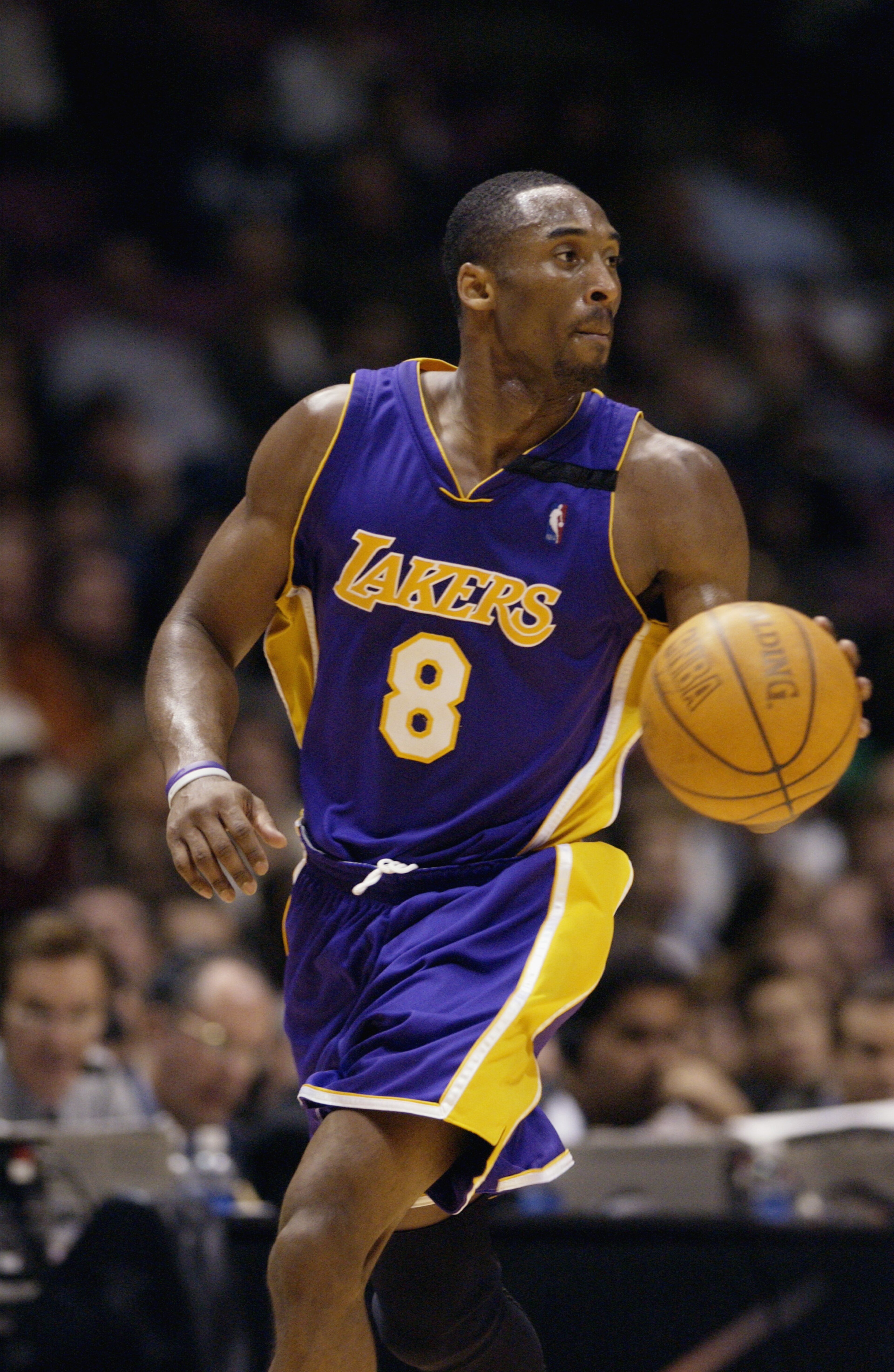 EAST RUTHERFORD, NJ - DECEMBER 19:  Kobe Bryant #8 of the Los Angeles Lakers moves the ball during the NBA game against the New Jersey Nets at Continental Airlines Arena on December 19, 2002 in East Rutherford, New Jersey.  The Nets won 98-71.  NOTE TO US