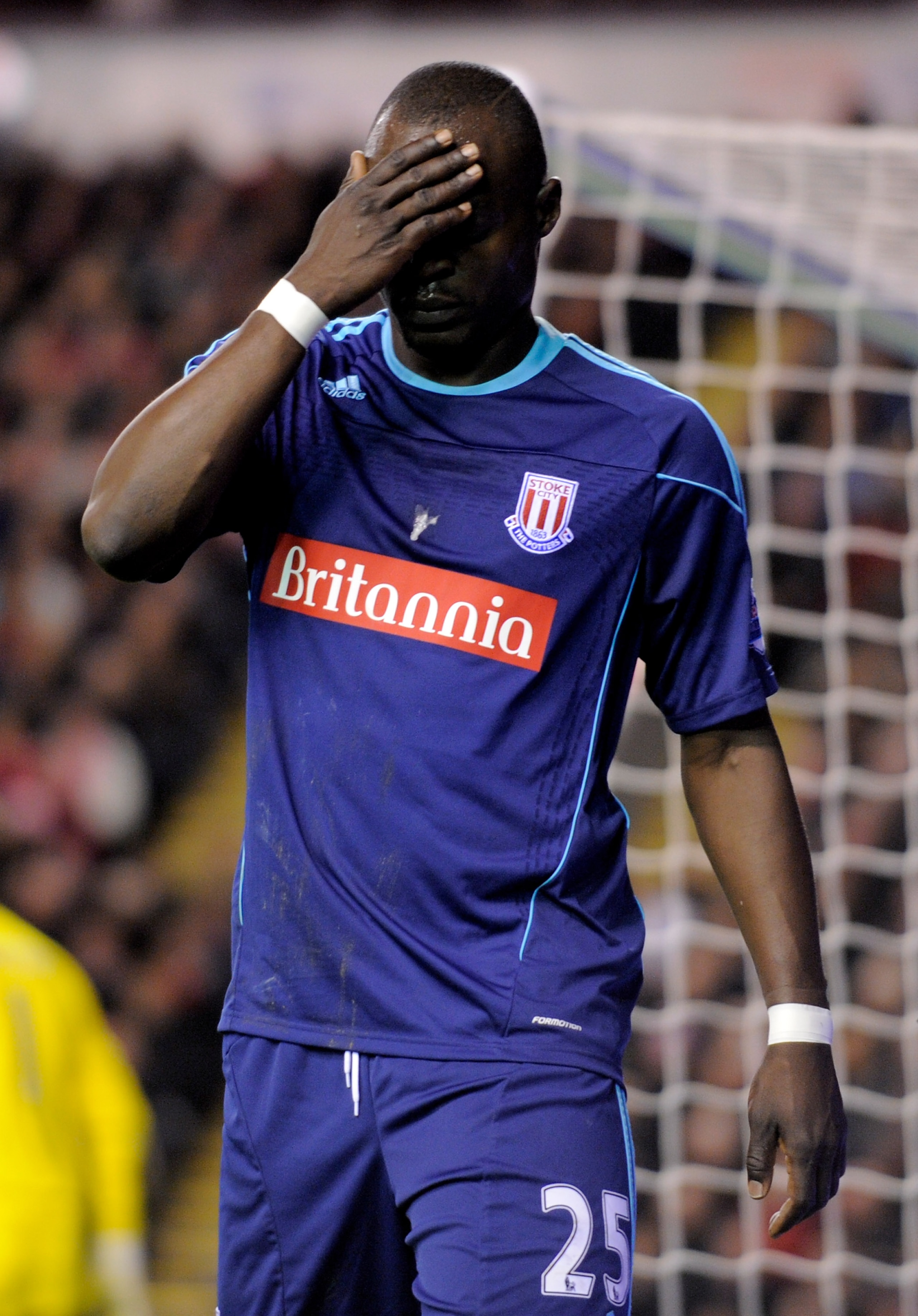 LIVERPOOL, ENGLAND - FEBRUARY 02:  Abdoulaye Faye of Stoke City reacts during the Barclays Premier League match between Liverpool and Stoke City at Anfield on February 2, 2011 in Liverpool, England. (Photo by Michael Regan/Getty Images)