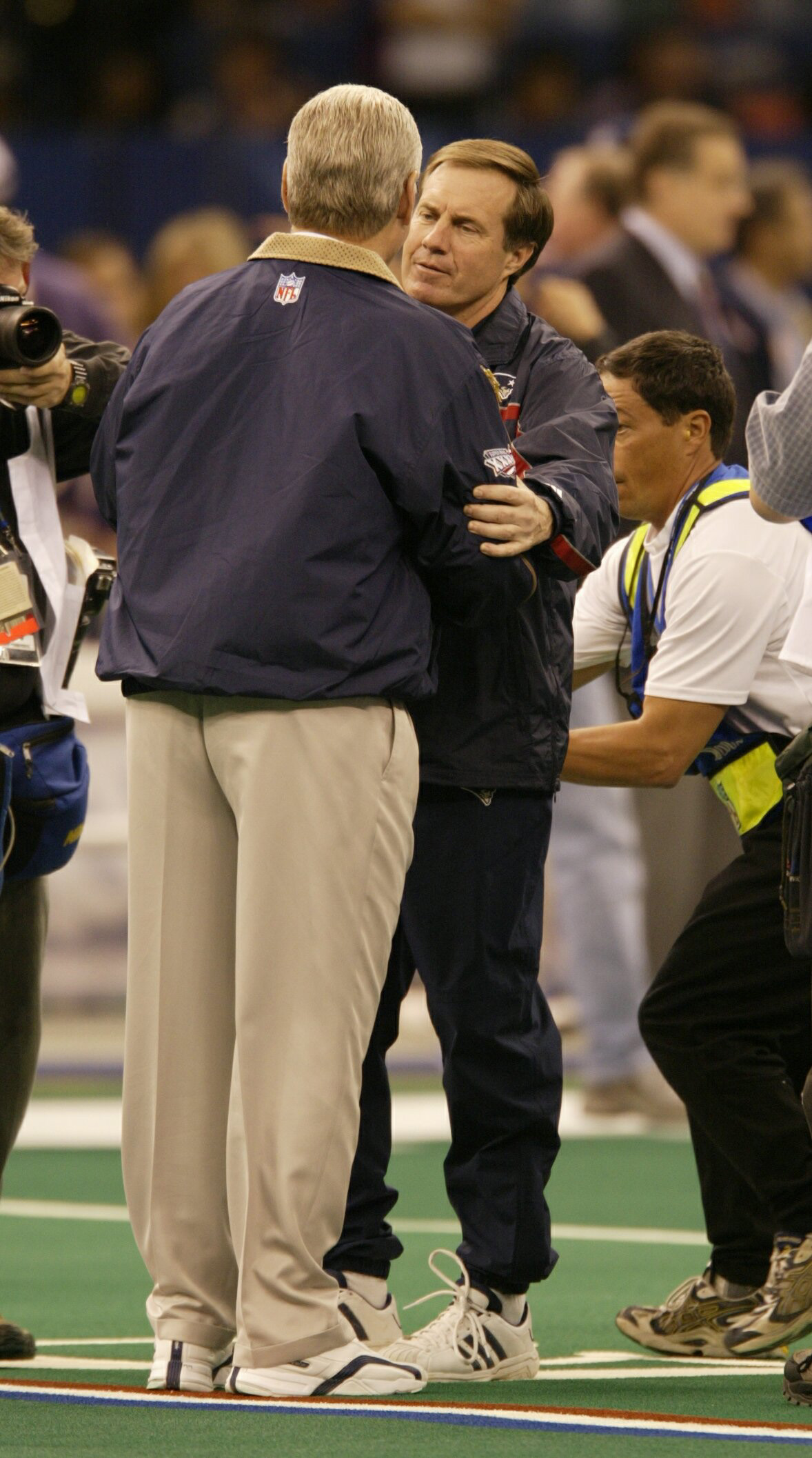 3 Feb 2002:  St. Louis Rams Head Coach Mike Martz, left, and New England Head Coach Bill Belichick shake hands before Super Bowl XXXVI at the Superdome in New Orleans, Louisiana. DIGITAL IMAGE.  Mandatory Credit: Brian Bahr/Getty Images