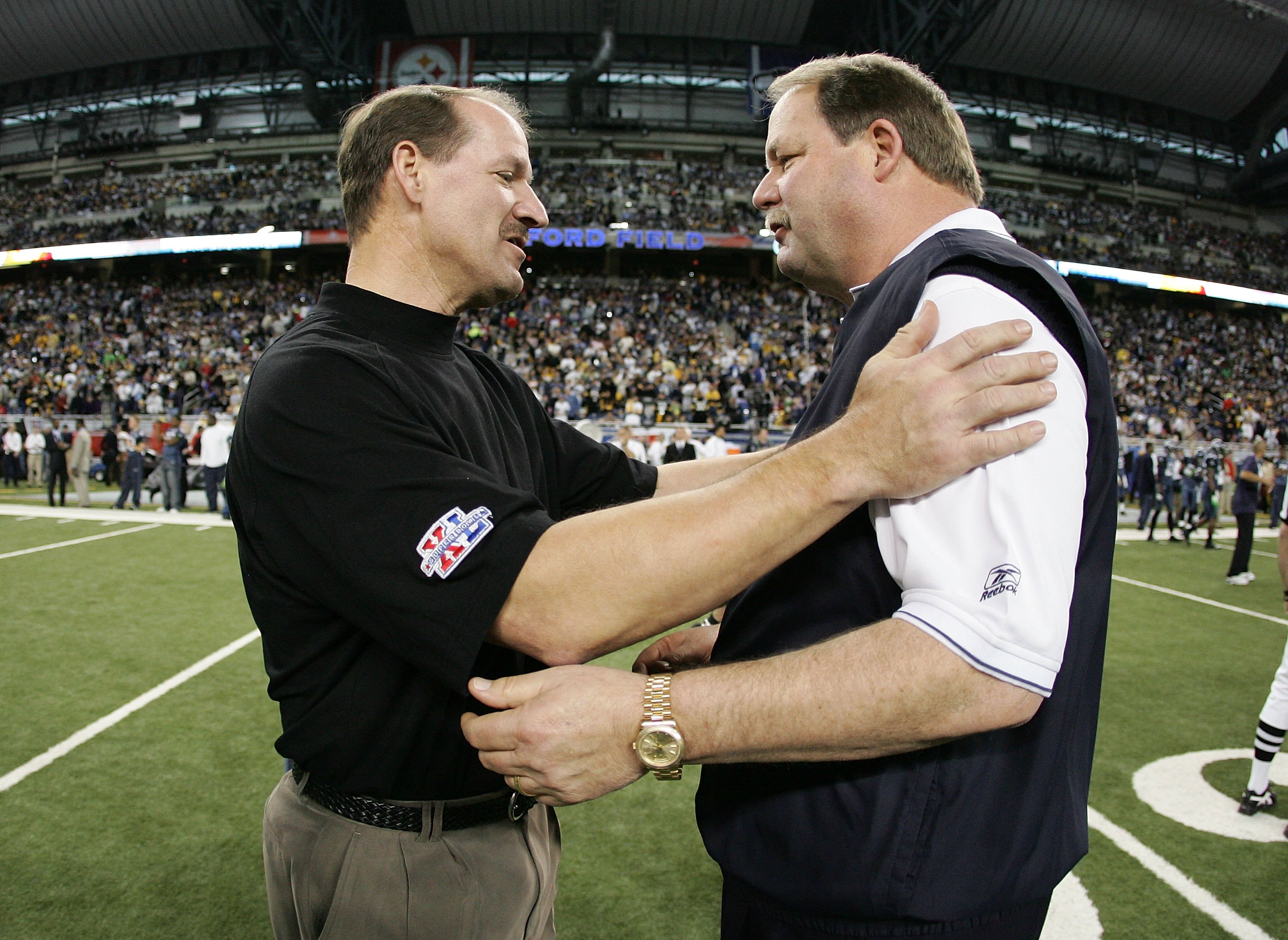 DETROIT - FEBRUARY 05:  Head coach Bill Cowher of the Pittsburgh Steelers shakes hands with head coach Mike Holmgren of the Seattle Seahawks before the start of Super Bowl XL at Ford Field on February 5, 2006 in Detroit, Michigan.  (Photo by Harry How/Get