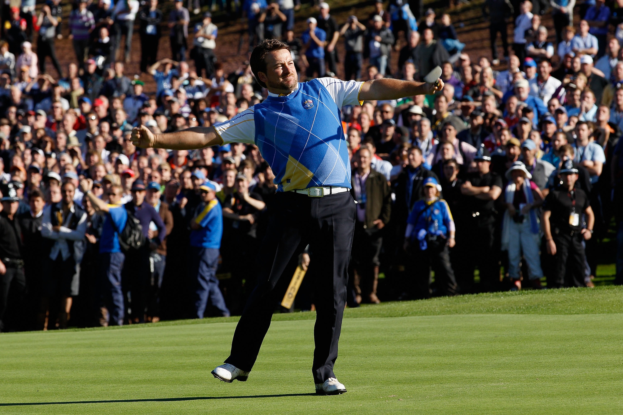 NEWPORT, WALES - OCTOBER 04: Graeme McDowell of Europe celebrates his birdie putt on the 16th green in the singles matches during the 2010 Ryder Cup at the Celtic Manor Resort on October 4, 2010 in Newport, Wales. (Photo by Sam Greenwood/Getty Images) NEWPORT, WALES - OCTOBER 04: Graeme McDowell of Europe celebrates his birdie putt on the 16th green in the singles matches during the 2010 Ryder Cup at the Celtic Manor Resort on October 4, 2010 in Newport, Wales. (Photo by Sam Greenwood/Getty Images)