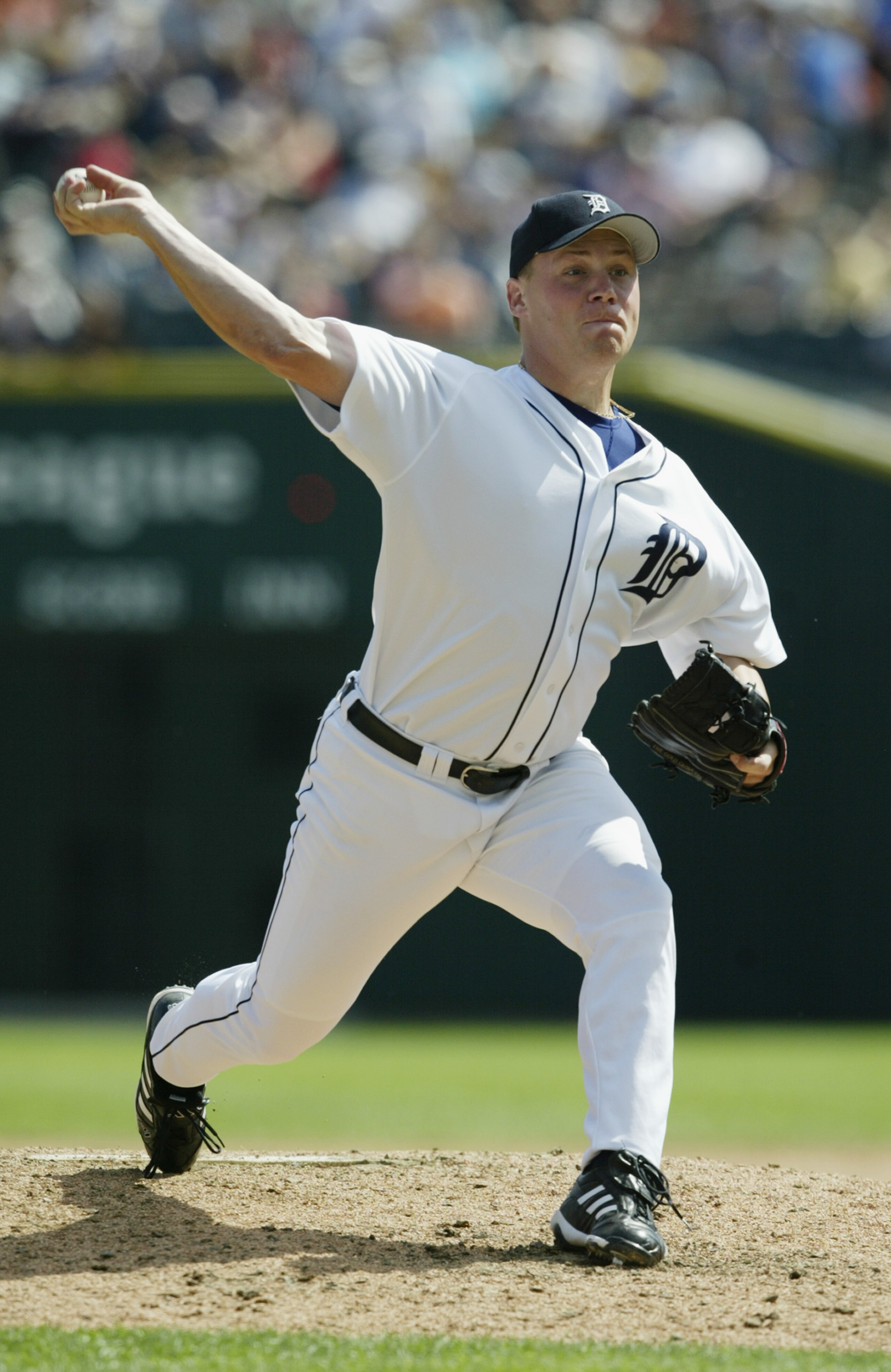 DETROIT- AUGUST 23:  Pitcher Matt Roney #52 of the Detroit Tigers delivers against the Anaheim Angels at Comerica Park on August 23, 2003 in Detroit, Michigan.  The Angels defeated the Tigers in 10 innings 14-8.  (Photo by Tom Pidgeon/Getty Images)