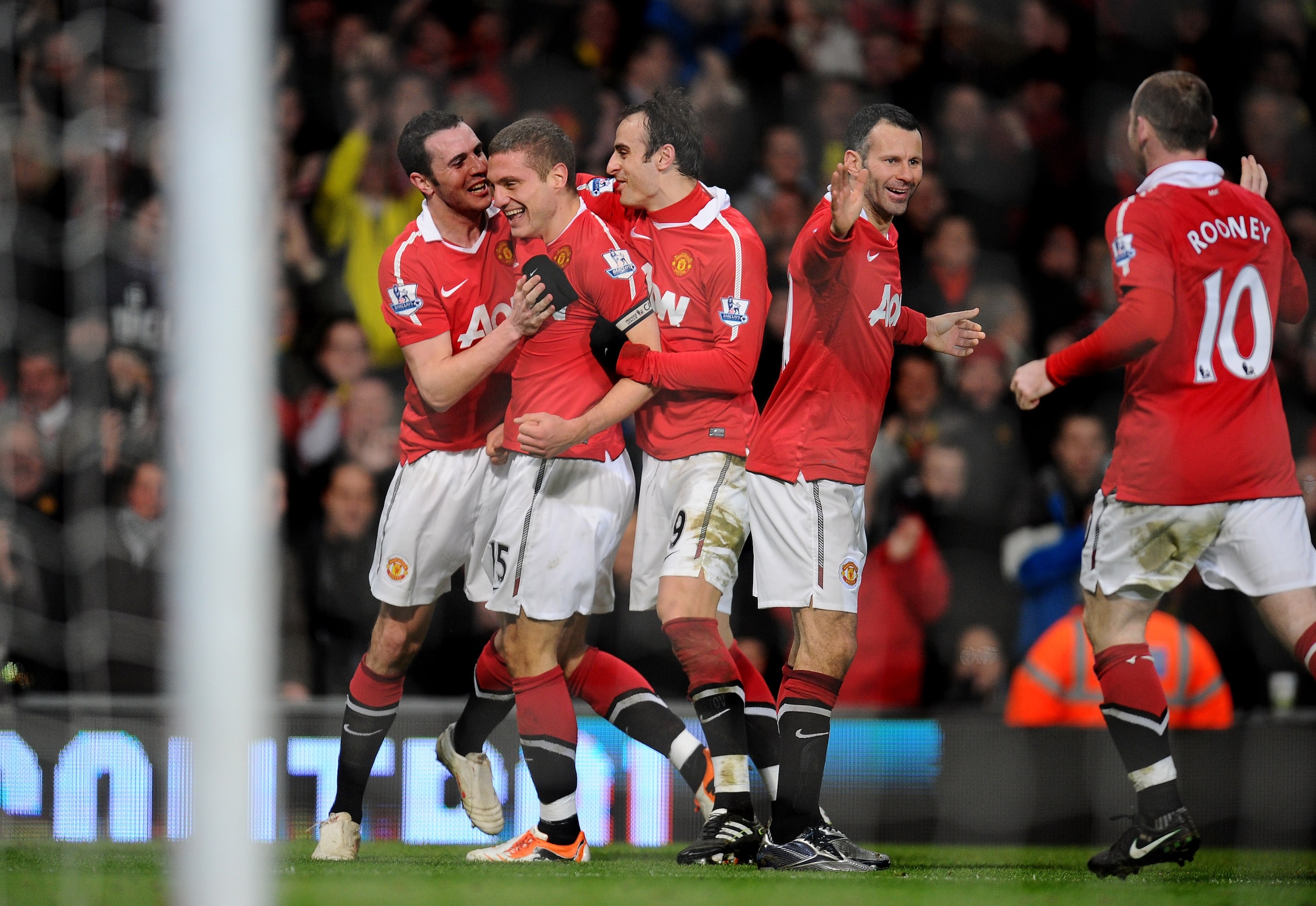 MANCHESTER, ENGLAND - FEBRUARY 01:  Nemanja Vidic of Manchester United celebrates with his team mates after scoring his team's third goal during the Barclays Premier League match between Manchester United and Aston Villa at Old Trafford on February 1, 201