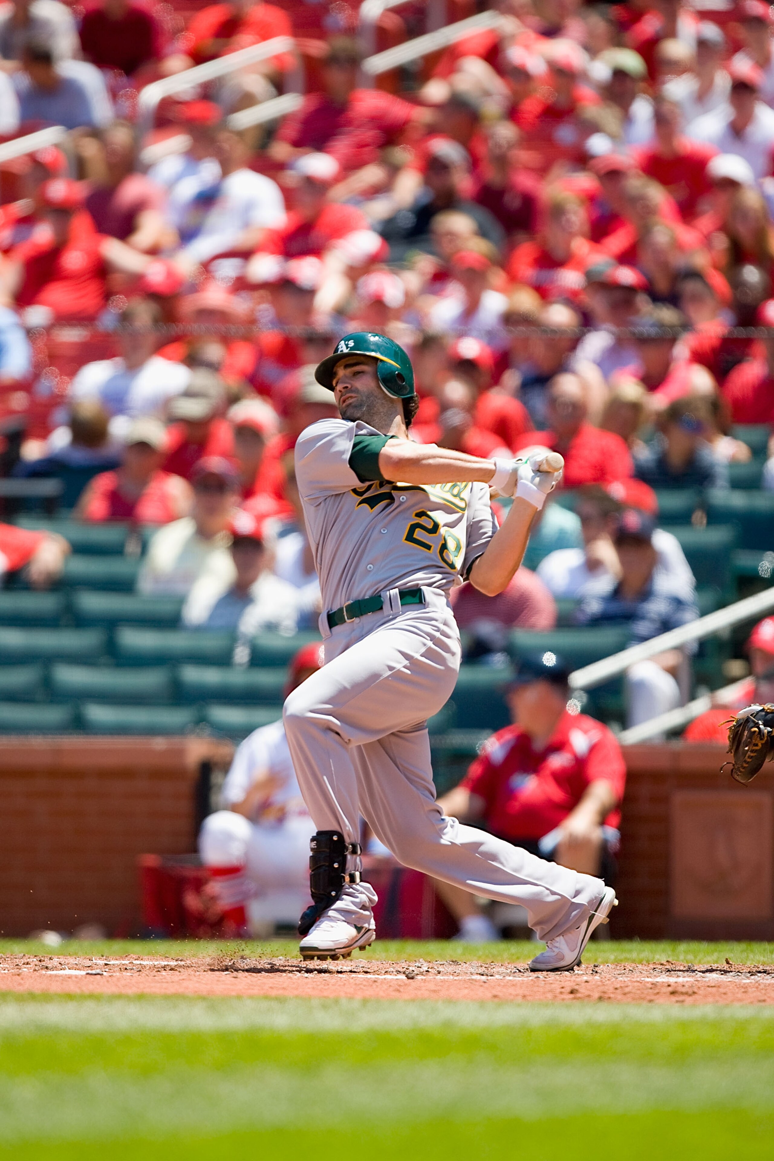 ST. LOUIS - JUNE 20: Conor Jackson #28 of the Oakland Athletics bats against the St. Louis Cardinals at Busch Stadium on June 20, 2010 in St. Louis, Missouri.  (Photo by Dilip Vishwanat/Getty Images)