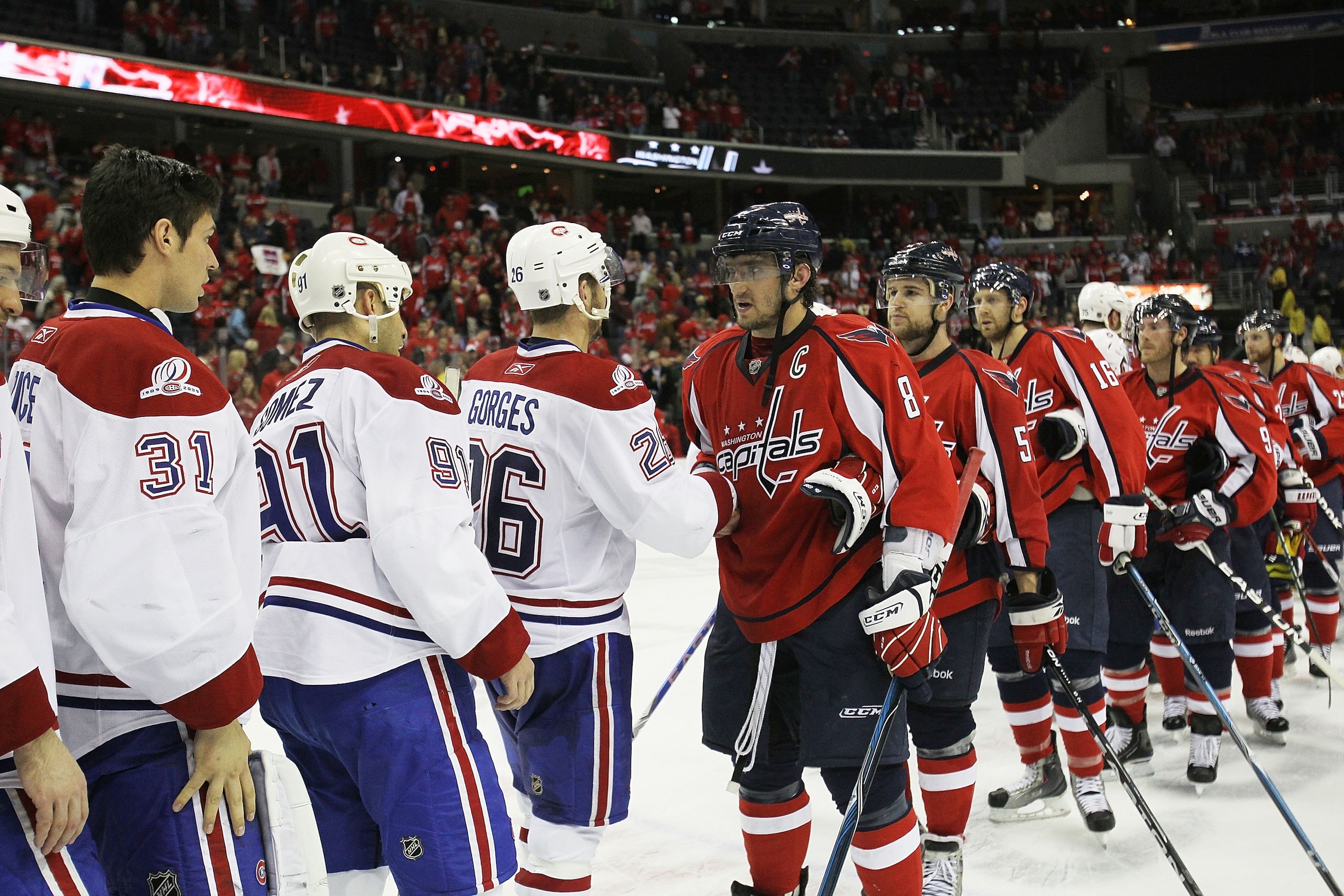 WASHINGTON - APRIL 28:  The Montreal Canadiens and the Washington Capitals shake hands following Game Seven of the Eastern Conference Quarterfinals during the 2010 NHL Stanley Cup Playoffs at the Verizon Center on April 28, 2010 in Washington, DC. The Can