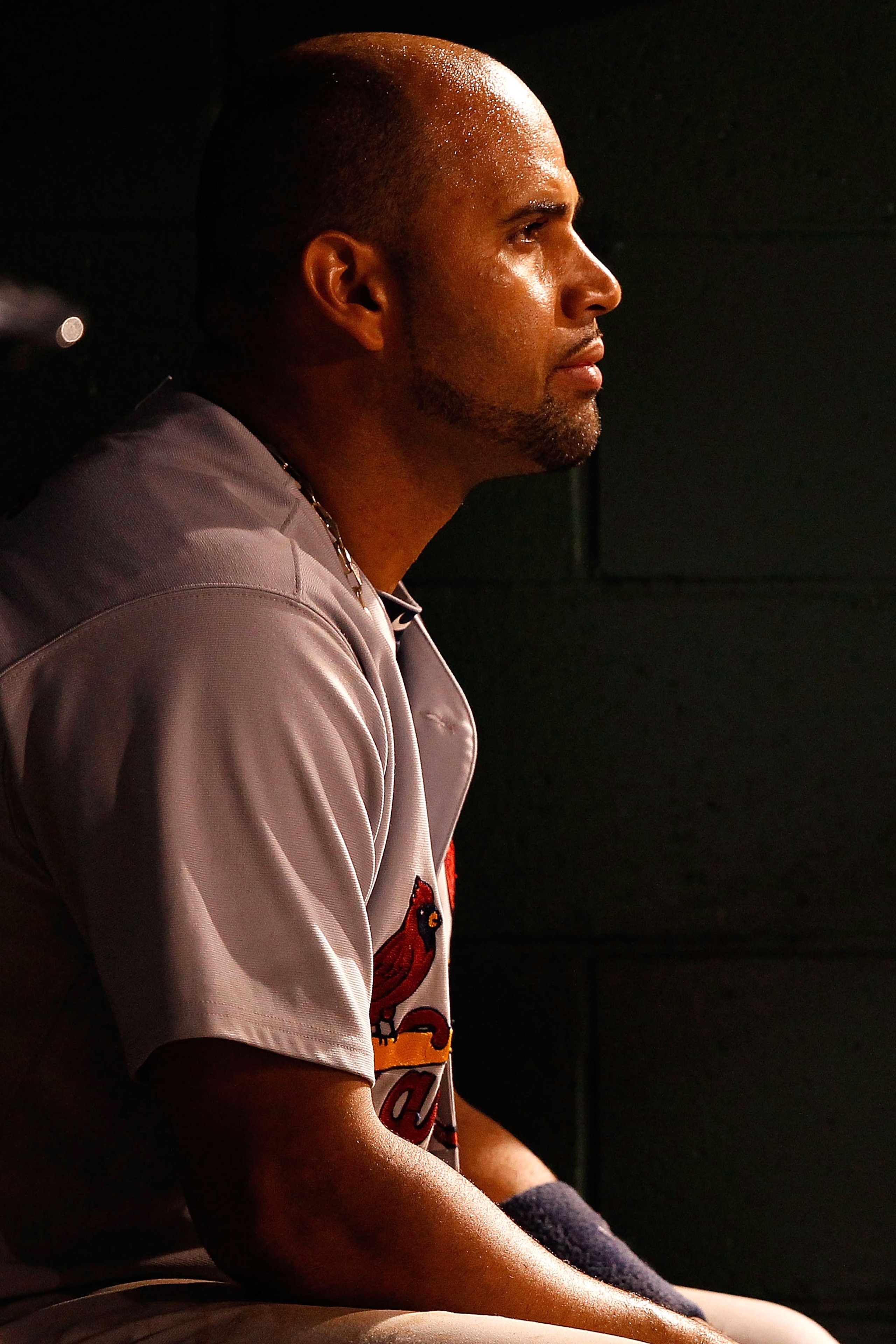 PITTSBURGH - AUGUST 23:  Albert Pujols #5 of the St Louis Cardinals sits in the dugout during the game against the Pittsburgh Pirates on August 23, 2010 at PNC Park in Pittsburgh, Pennsylvania. St. Louis beat Pittsburgh 10-2.   (Photo by Jared Wickerham/G