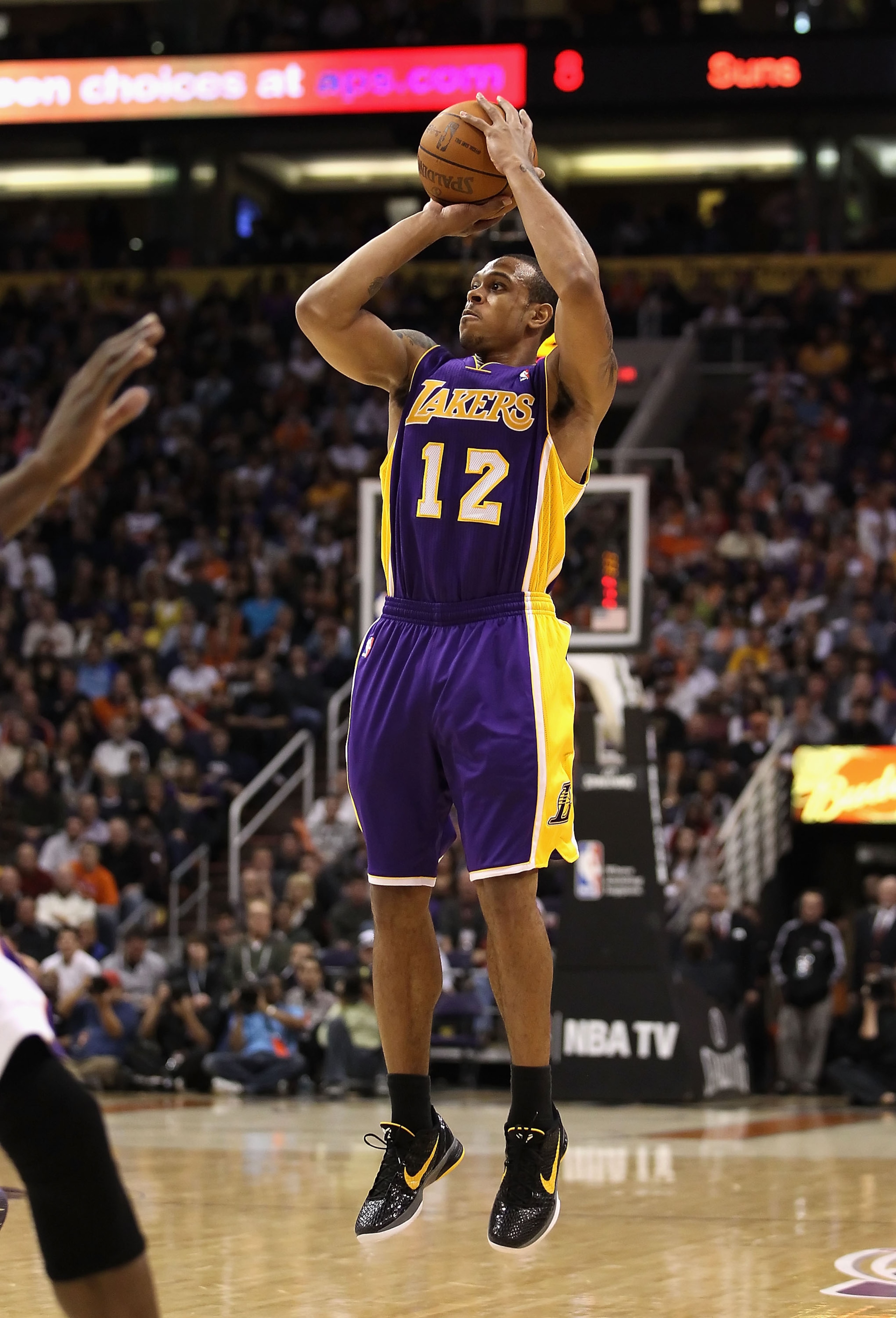 PHOENIX, AZ - JANUARY 05:  Shannon Brown #12 of the Los Angeles Lakers puts up a shot against the Phoenix Suns during the NBA game at US Airways Center on January 5, 2011 in Phoenix, Arizona. The Lakers defeated the Suns 99-95.  NOTE TO USER: User express