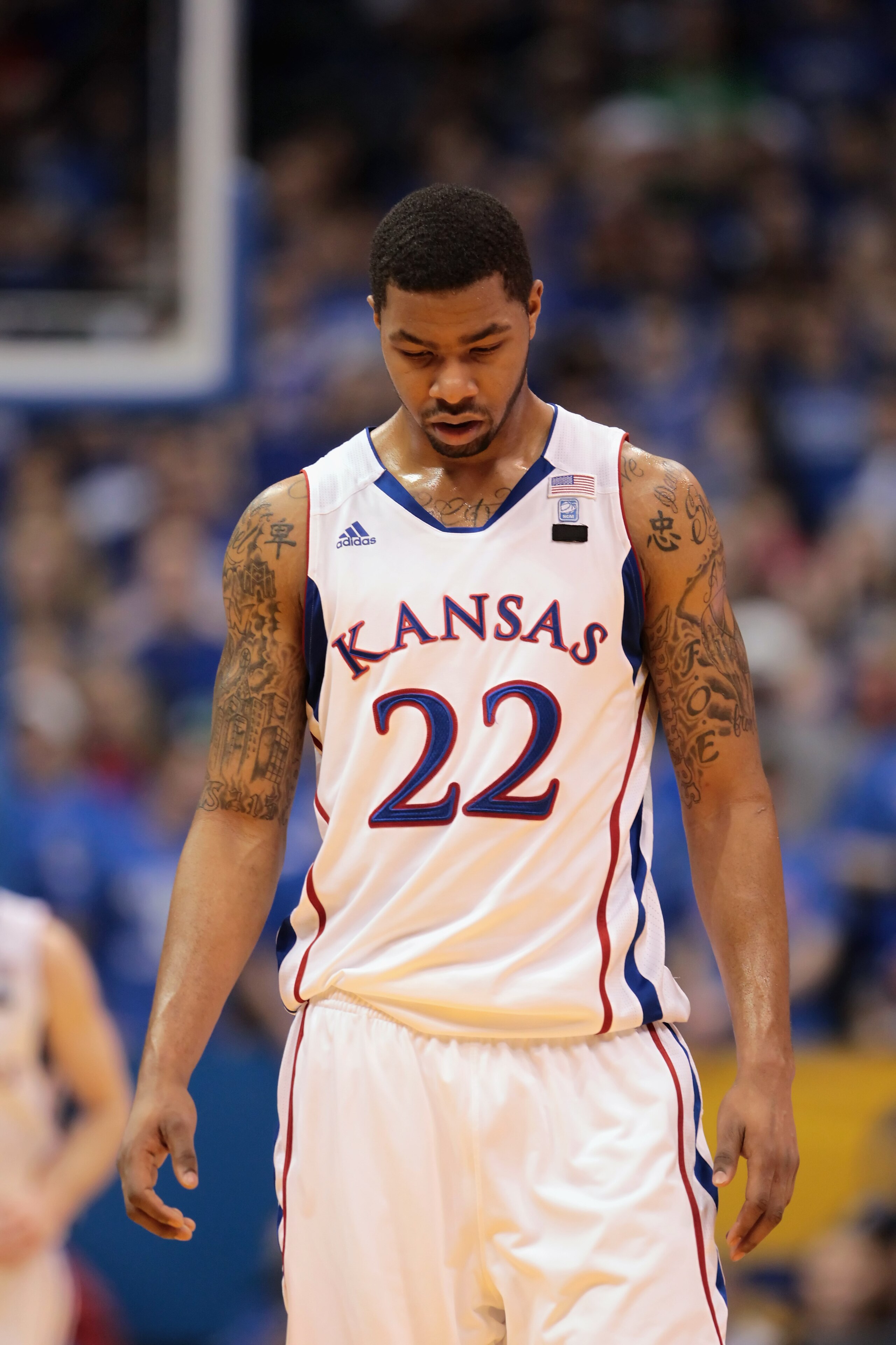 LAWRENCE, KS - JANUARY 22:  Marcus Morris #22 of the Kansas Jayhawks walks off the court during a timeout during the game against the Texas Longhorns on January 22, 2011 at Allen Fieldhouse in Lawrence, Kansas.  (Photo by Jamie Squire/Getty Images)