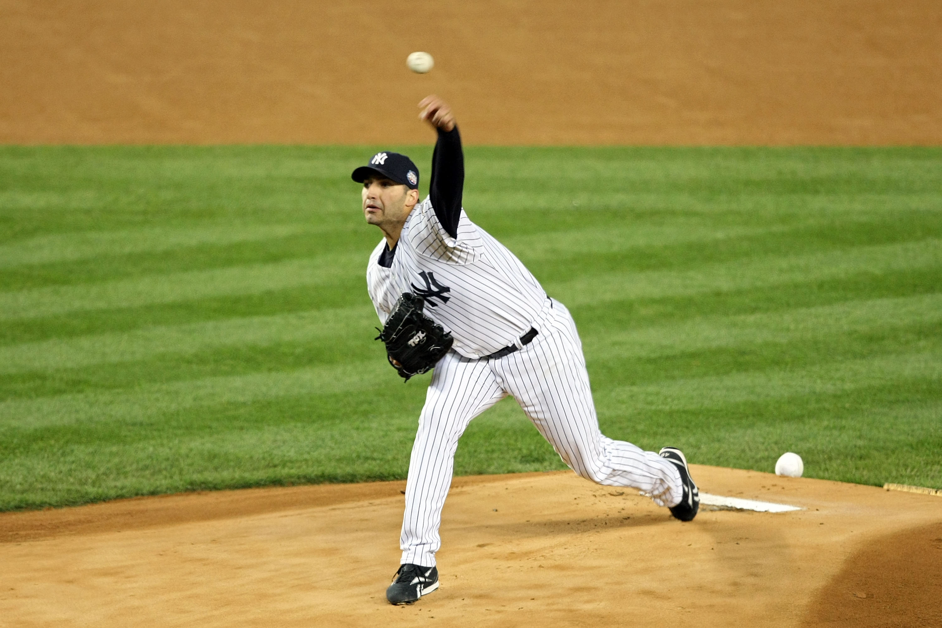 Retired Yankee and Astro pitcher ANDY PETTITTE throws out the ceremonial  first pitch