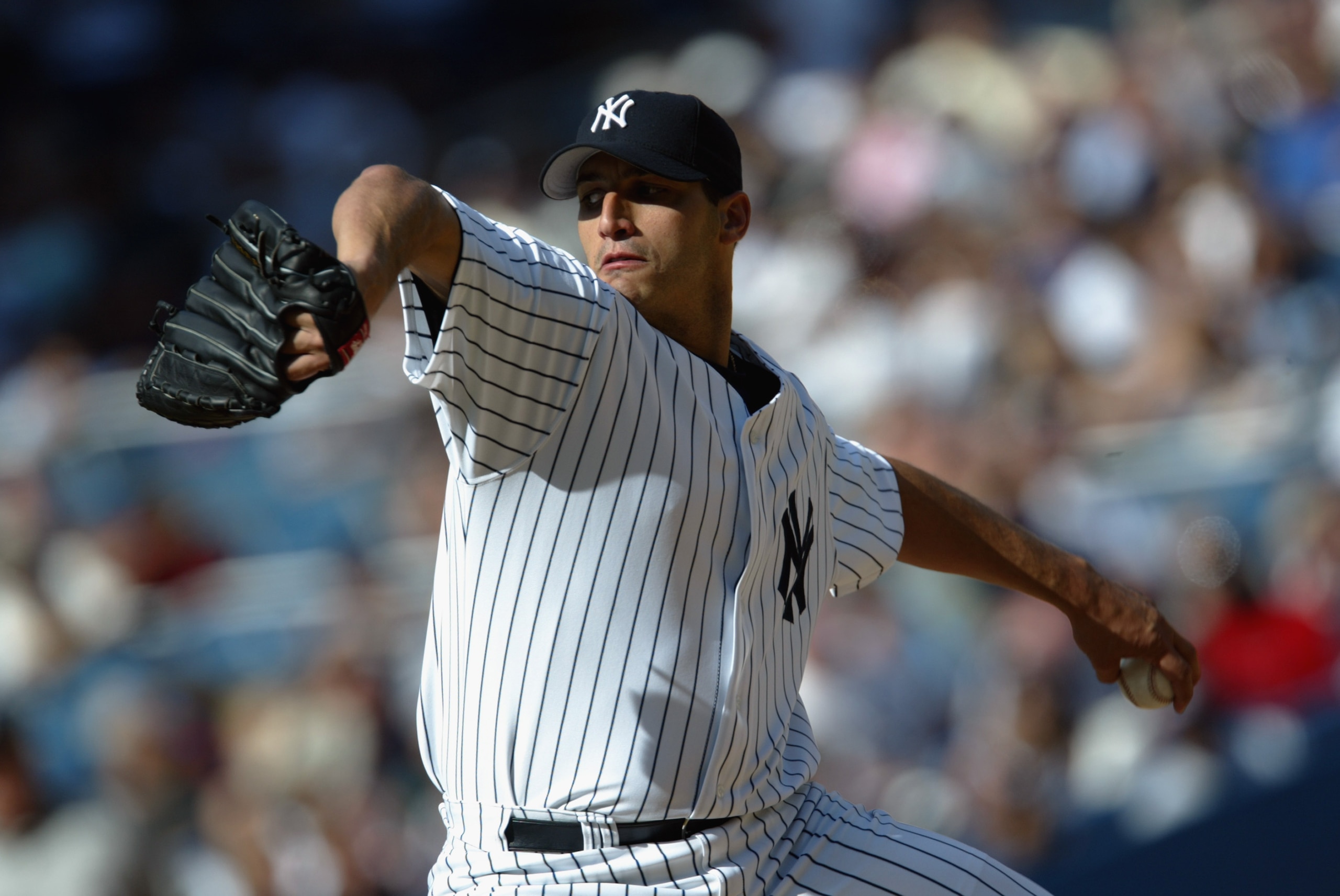 BRONX, NY - AUGUST 08:  Starting Pitcher Andy Pettitte #46 of New York Yankees throws against the Kansas City Royals during the game on August 8, 2002 at Yankee Stadium in the Bronx, New York.  The Yankees defeated the Royals 6-3.  (Photo by Al Bello/Gett