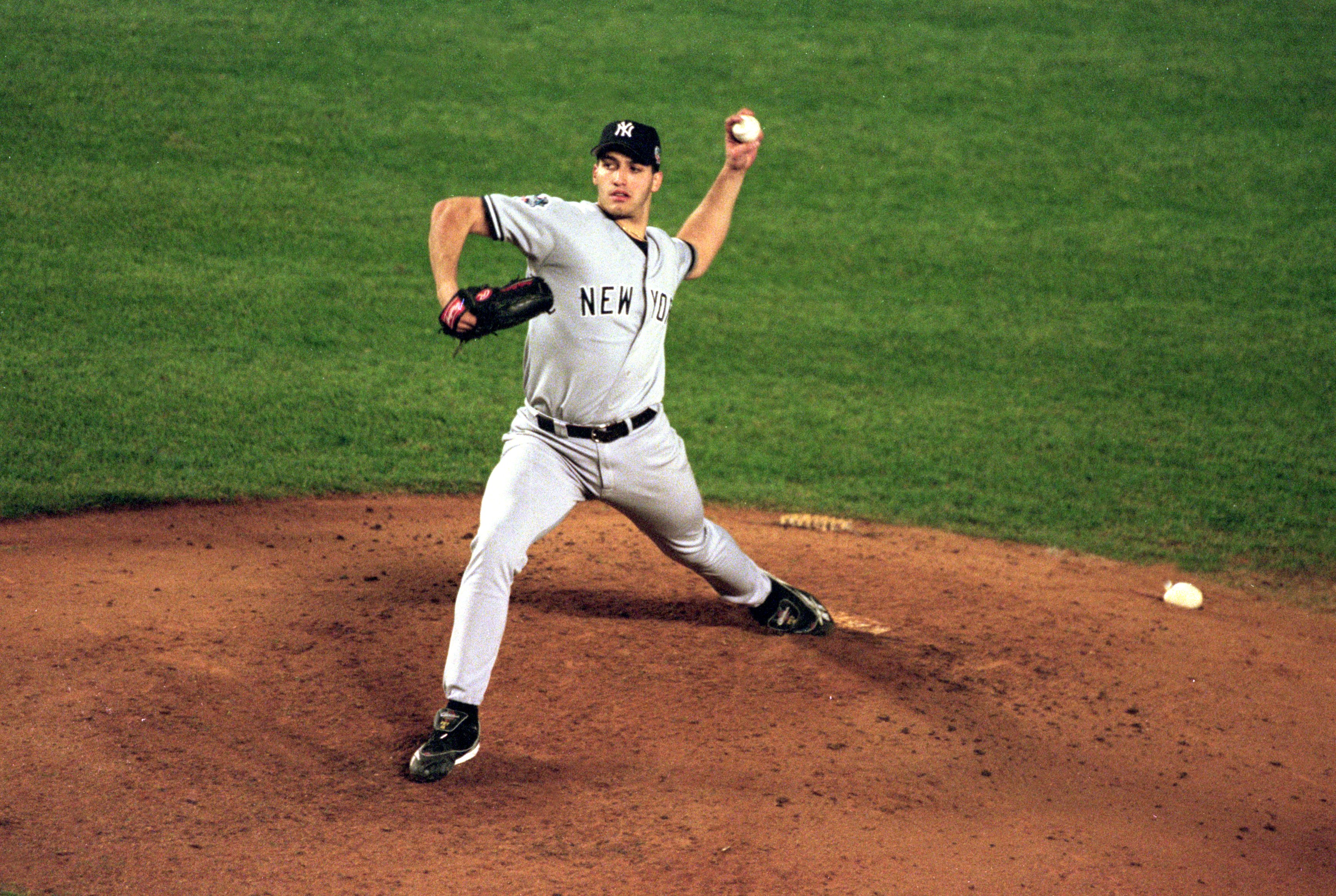 26 Oct 2000:  Andy Pettitte #46 of the New York Yankees winds up and throws a pitch during Game 5 of the 2000 World Series against the New York Mets at Shea Stadium in New York, New York.  The Yankees defeated the Mets 4-2.Mandatory Credit: Al Bello  /All