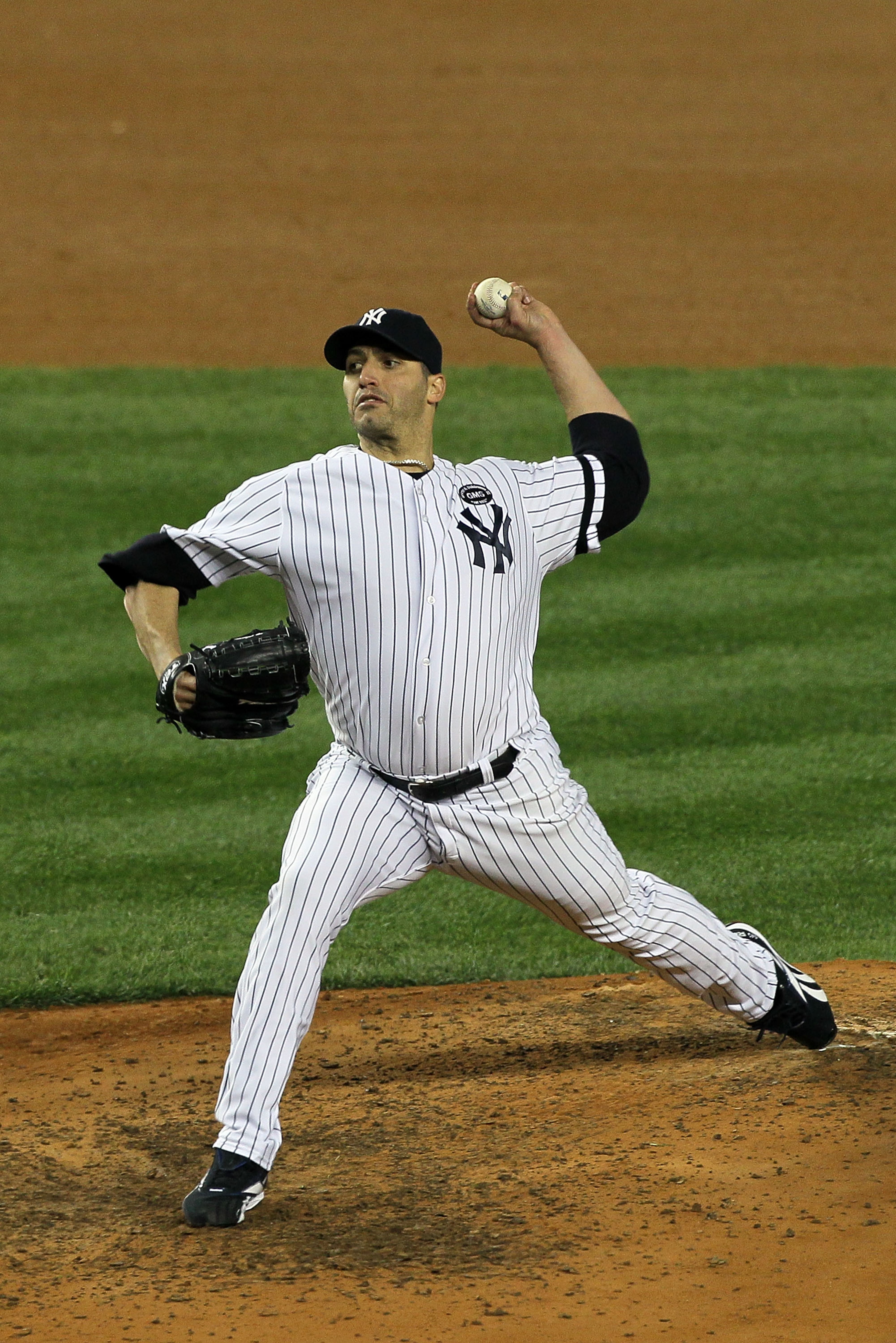 NEW YORK - OCTOBER 18: Starting pitcher Andy Pettitte #46 of the New York Yankees pitches against the Texas Rangers in Game Three of the ALCS during the 2010 MLB Playoffs at Yankee Stadium on October 18, 2010 in New York, New York. The Raners won 8-0. ( NEW YORK - OCTOBER 18: Starting pitcher Andy Pettitte #46 of the New York Yankees pitches against the Texas Rangers in Game Three of the ALCS during the 2010 MLB Playoffs at Yankee Stadium on October 18, 2010 in New York, New York. The Raners won 8-0. (