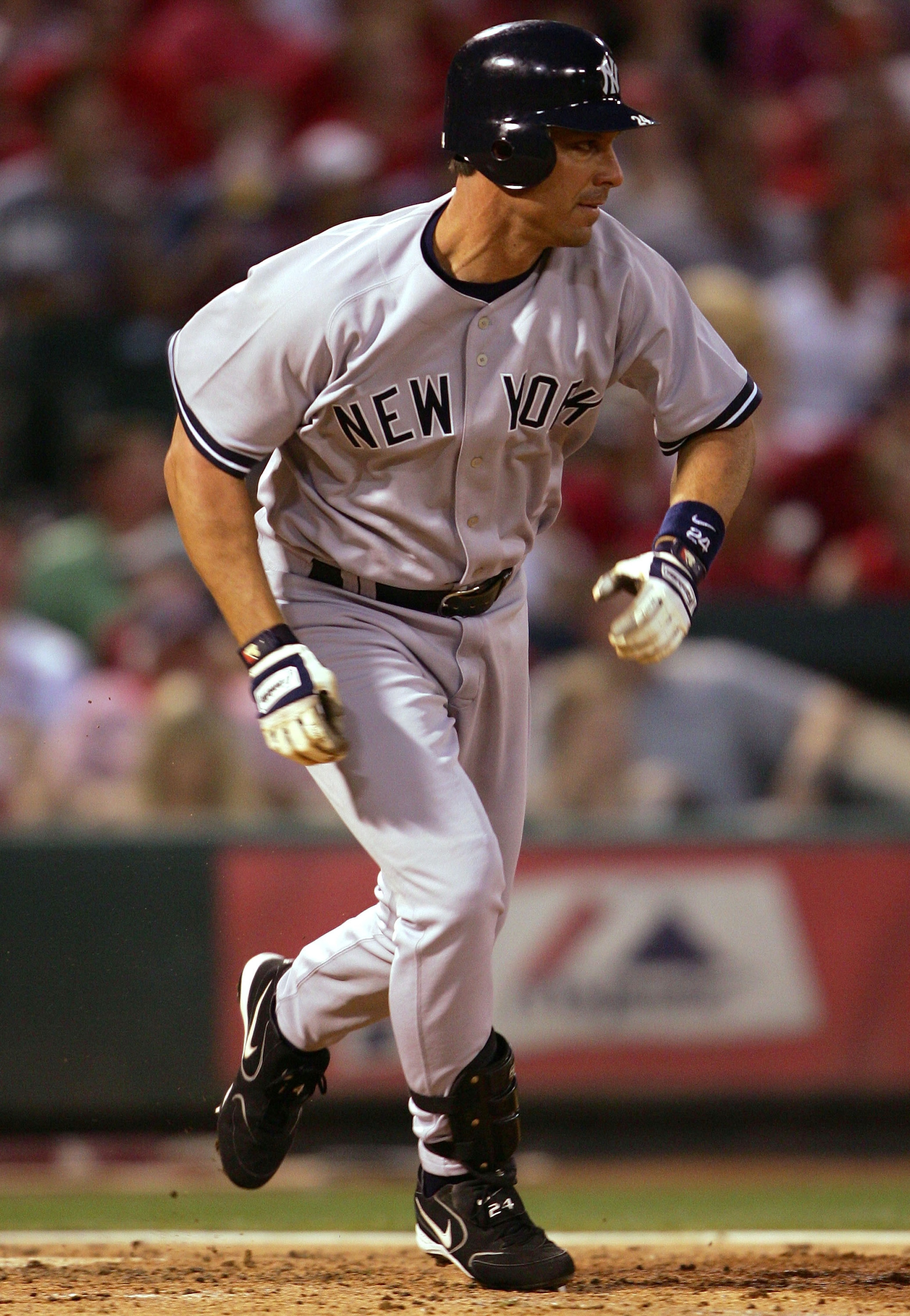 ST. LOUIS - JUNE 10:  Tino Martinez #24 of the New York Yankees pinch hits in the fifth inning against the St. Louis Cardinals on June 10, 2005 at Busch Stadium in St. Louis, Missouri.  (Photo by Elsa/Getty Images)